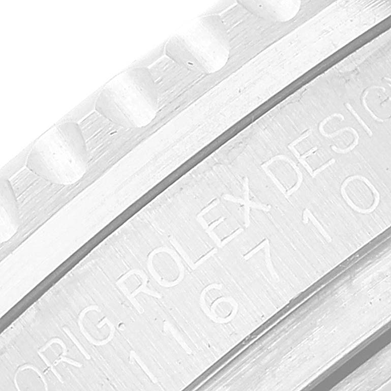 This close-up image shows the engraved side view of the Rolex GMT-Master 116710 Men's Stainless Steel Black Dial 116710 Men's Stainless Steel Black Dial watch casing with model details.