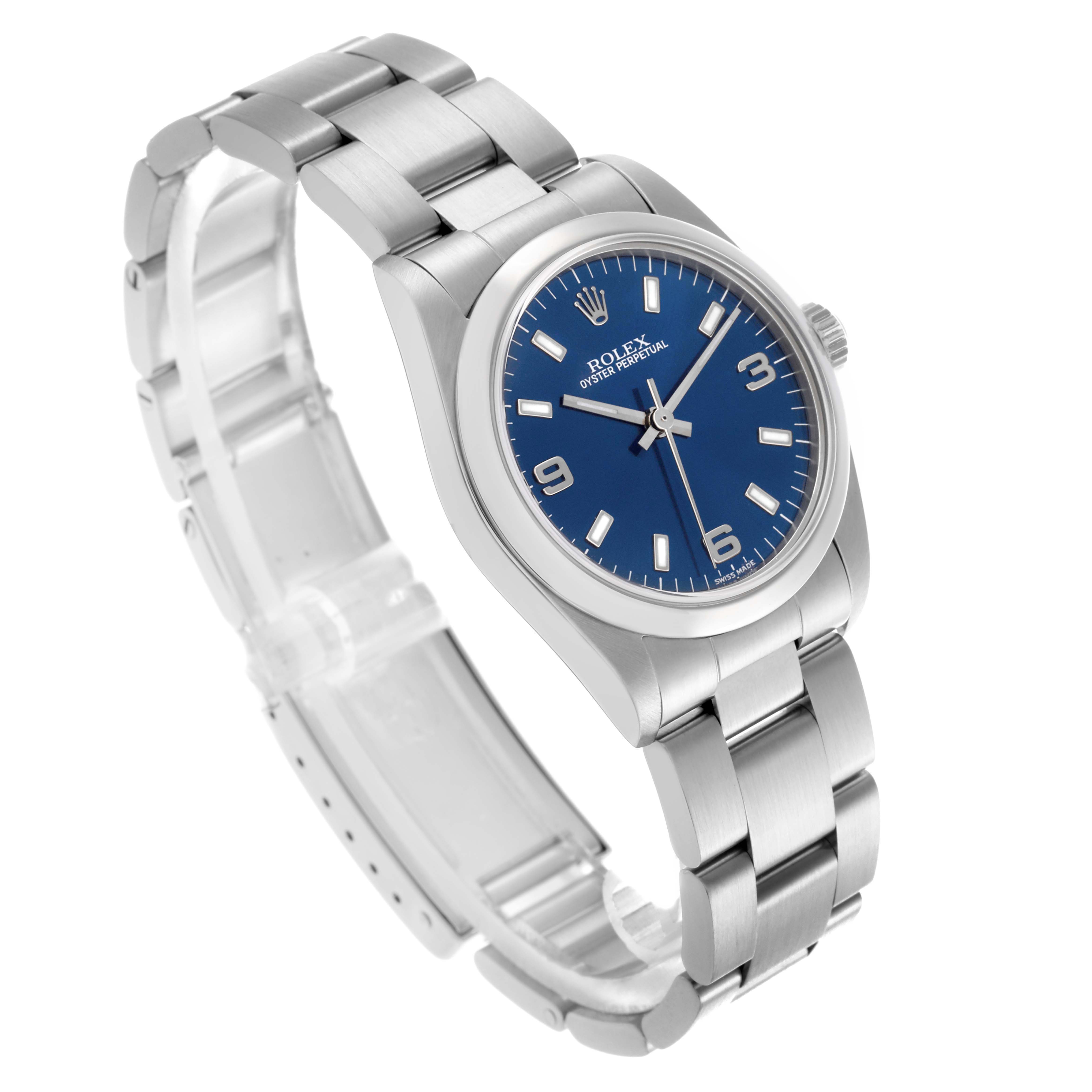 The Rolex Mid-Size 77080 Women's Stainless Steel Blue Dial 77080 Women's Stainless Steel Blue Dial watch is shown at a three-quarter angle, highlighting the blue dial, stainless steel bracelet, and watch case.