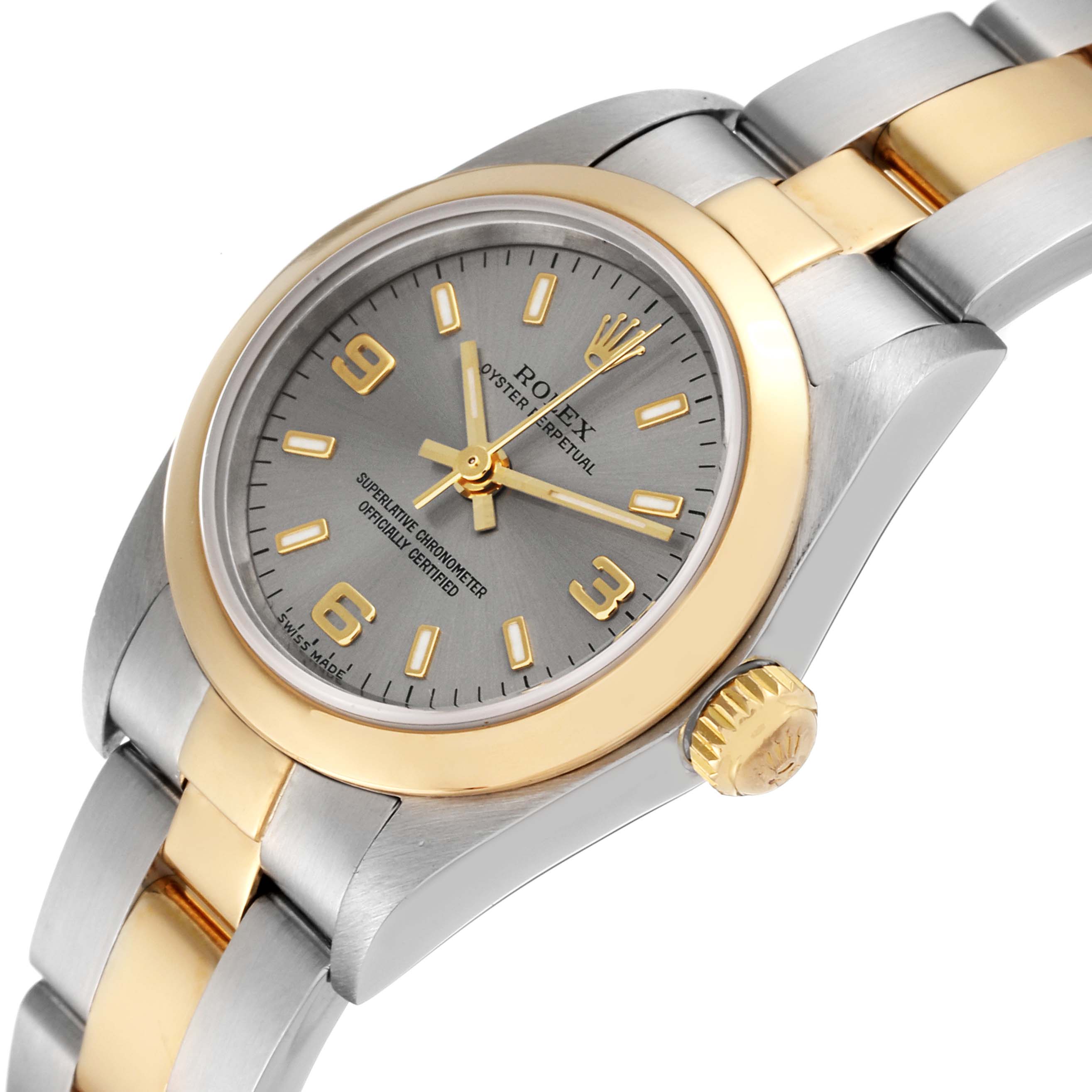 This image shows a partially tilted angle of a Rolex Oyster Perpetual 76183 Women's Steel and Gold (two tone) Grey Dial 76183 Women's Steel and Gold (two tone) Grey Dial watch, highlighting its dial, crown, and two-tone bracelet.