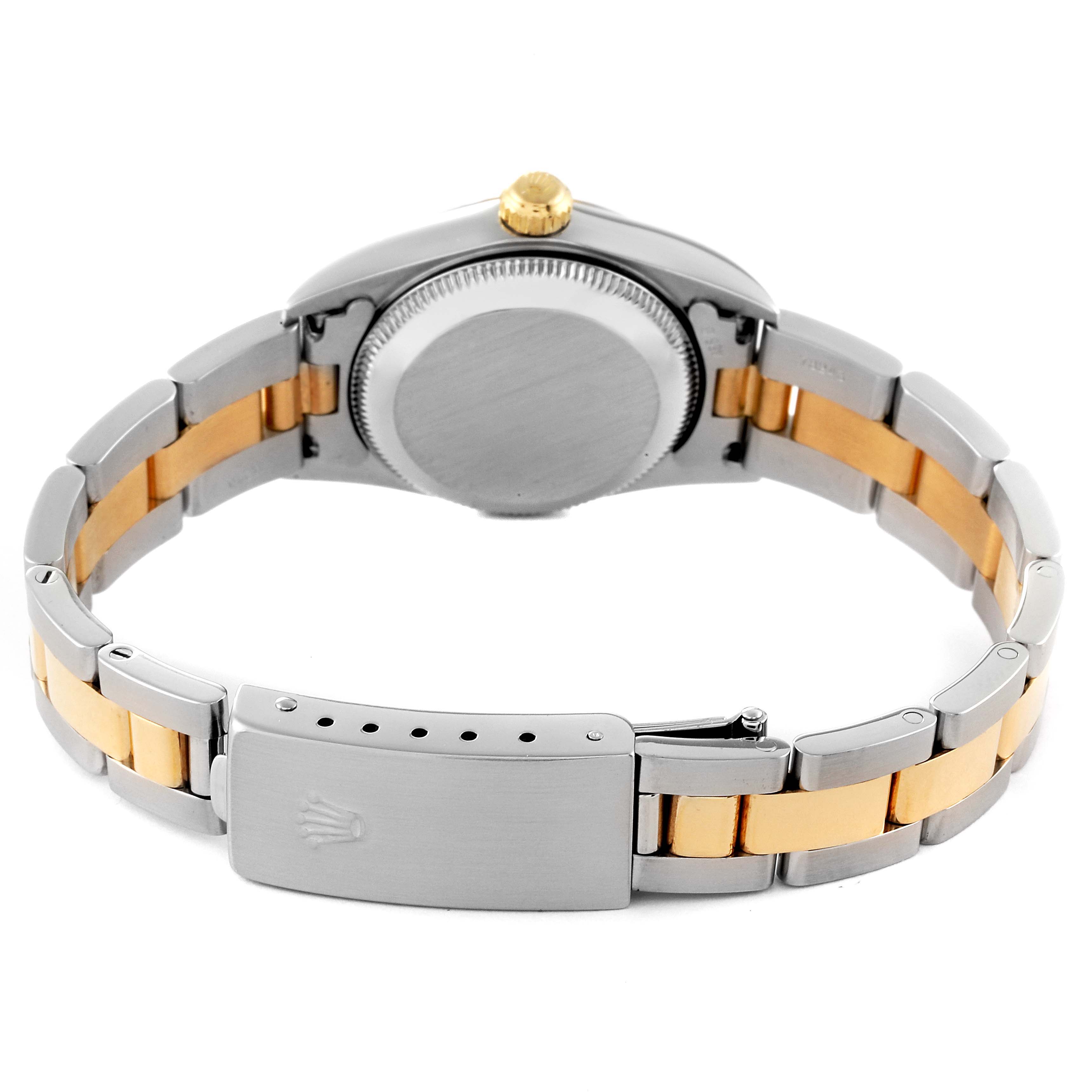This image shows the back and clasp of a Rolex Oyster Perpetual 76183 Women's Steel and Gold (two tone) Grey Dial 76183 Women's Steel and Gold (two tone) Grey Dial watch, highlighting its two-tone metal bracelet.
