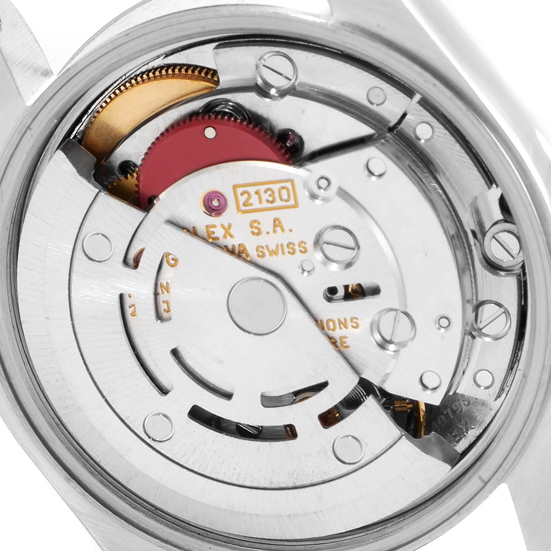 This image shows the internal mechanism of a Rolex Oyster Perpetual 67180 Women's Stainless Steel White Dial 67180 Women's Stainless Steel White Dial watch from a close-up bottom view.