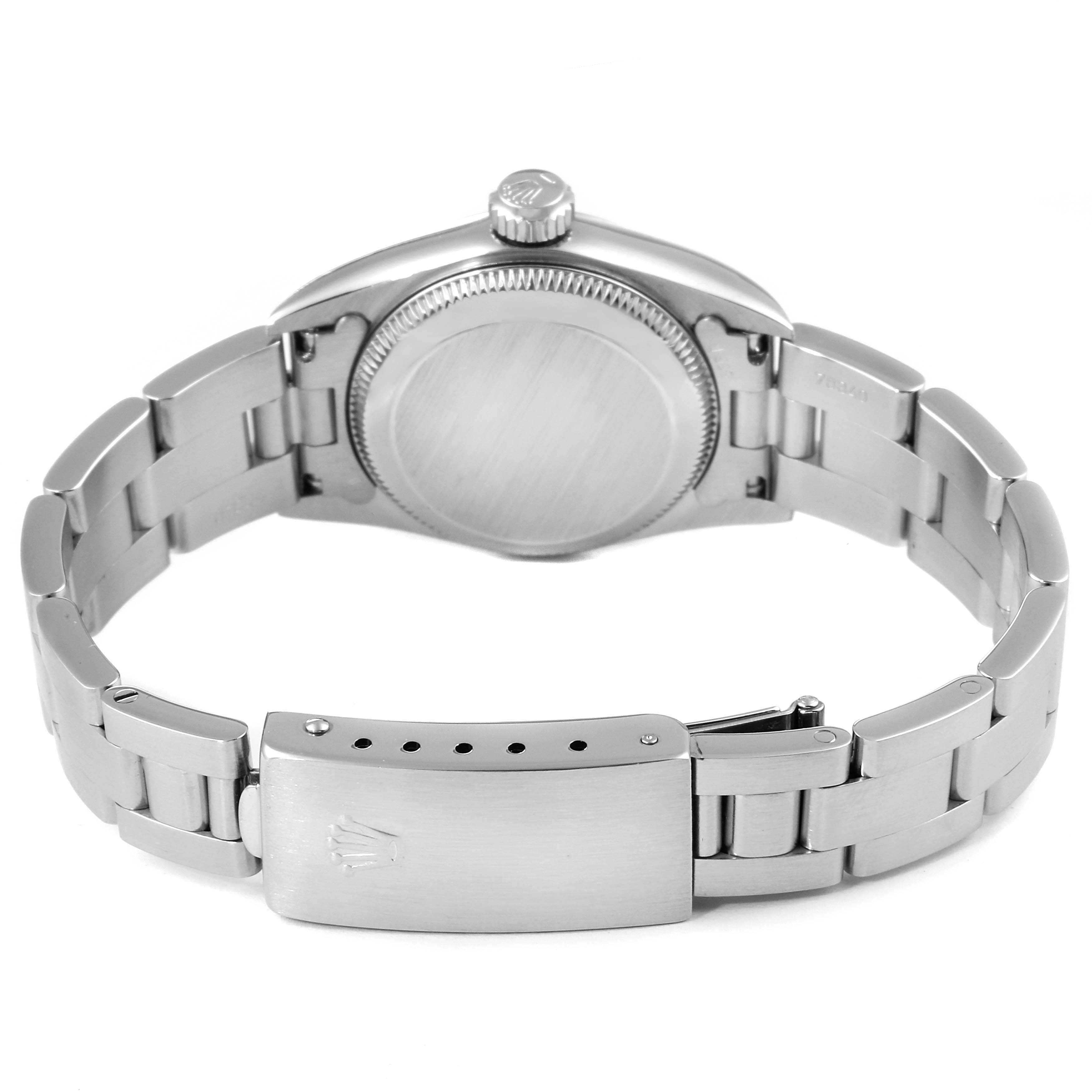 This image shows the back case and bracelet of a Rolex Oyster Perpetual 67180 Women's Stainless Steel White Dial 67180 Women's Stainless Steel White Dial watch, focusing on the clasp and case back.