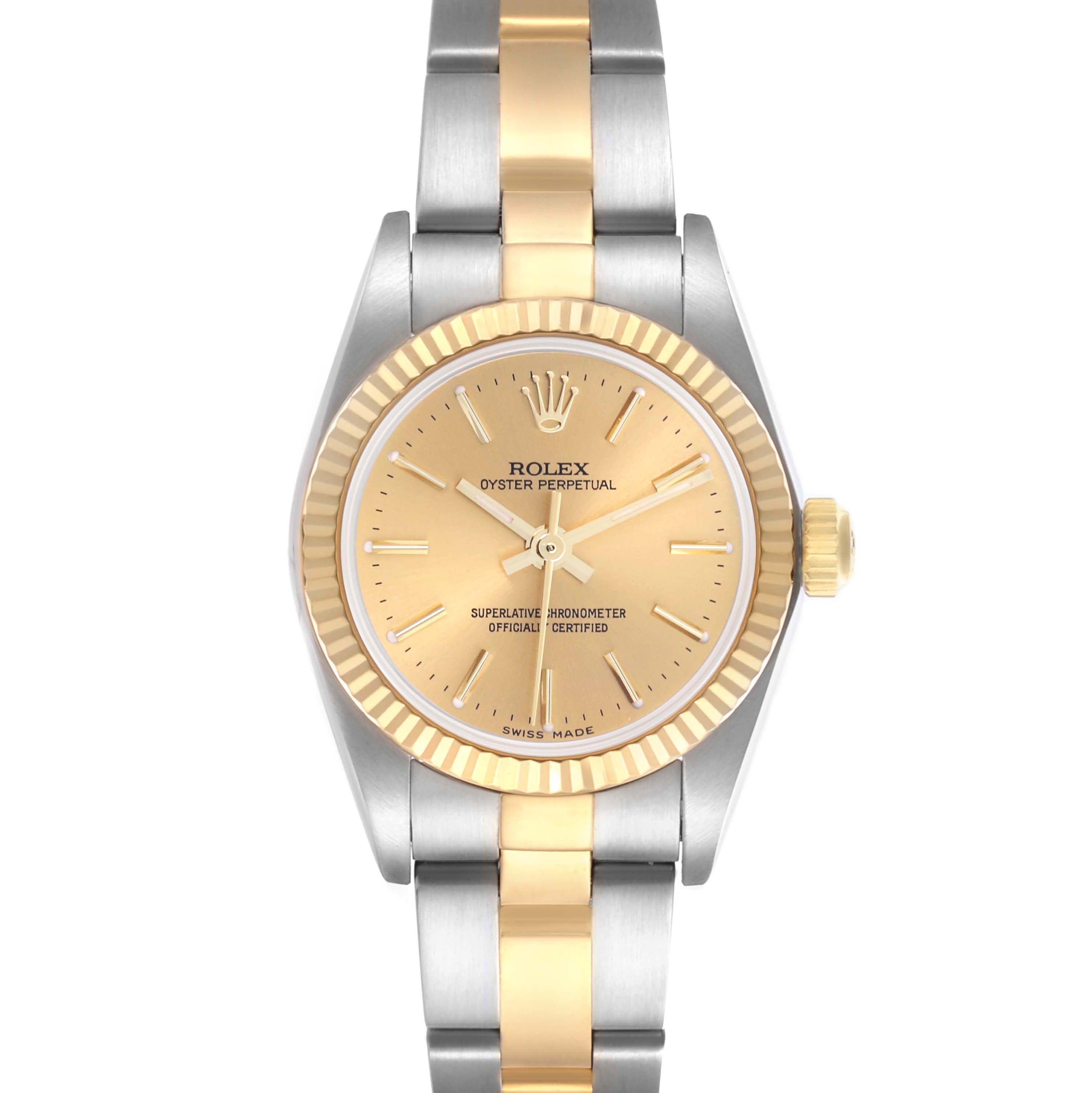 The Rolex Oyster Perpetual 76193 Women's Steel and Gold (two tone) Champagne Dial 76193 Women's Steel and Gold (two tone) Champagne Dial watch is shown from a front angle, highlighting its two-tone dial and bracelet.