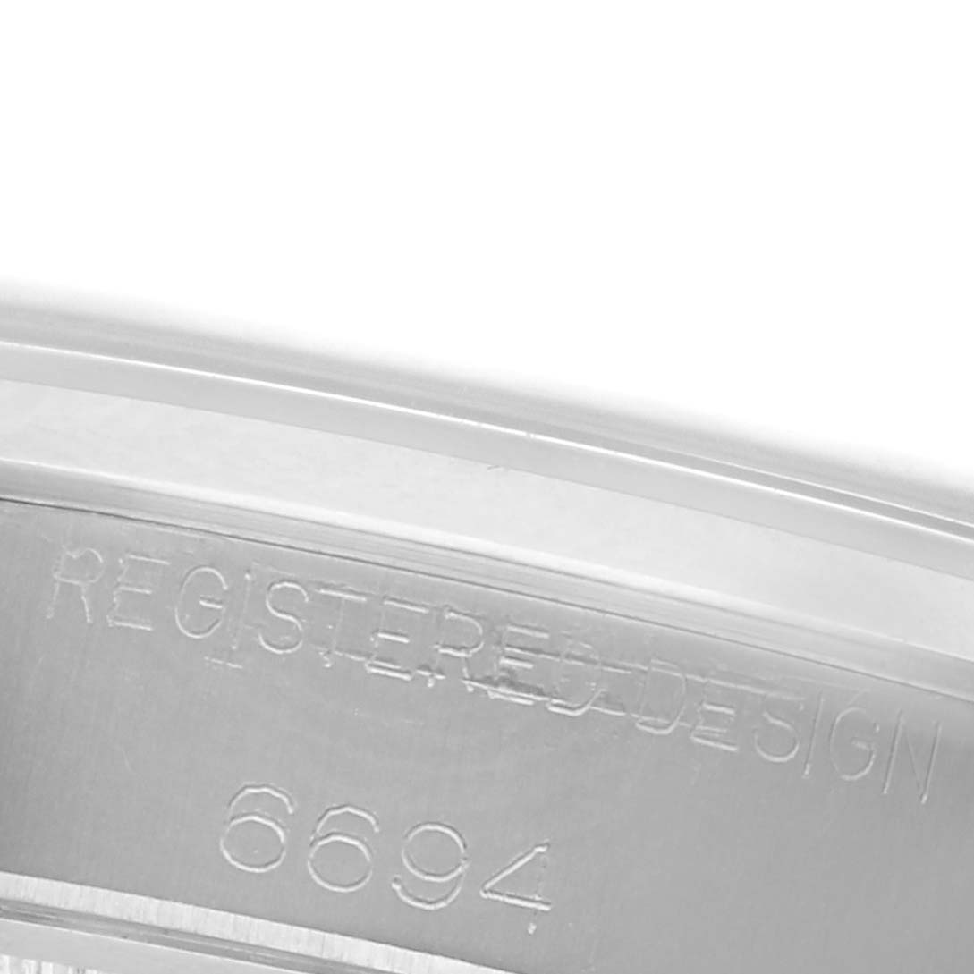 The image shows the inside case engraving of a Rolex Date 6694 Men's Stainless Steel Silver Dial 6694 Men's Stainless Steel Silver Dial model, displaying the design registration number.