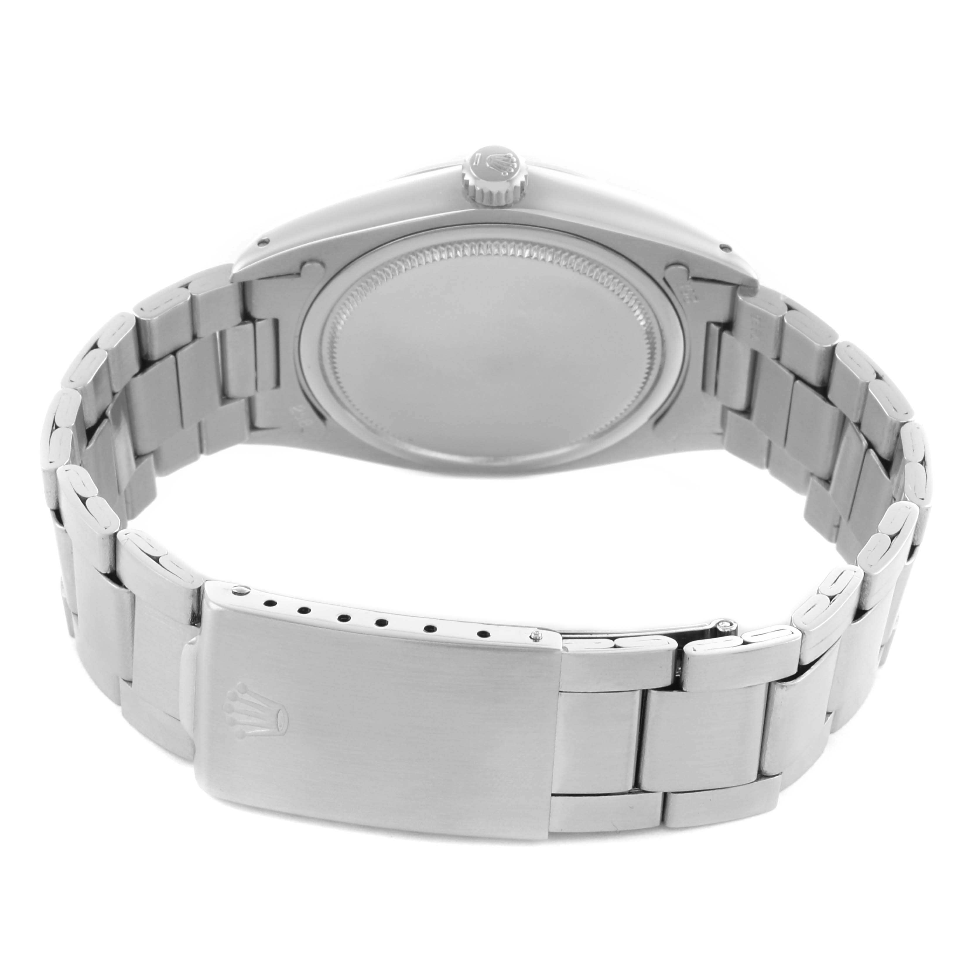 The image shows the back and clasp of a Rolex Date 6694 Men's Stainless Steel Silver Dial 6694 Men's Stainless Steel Silver Dial model watch, featuring its bracelet and case back.