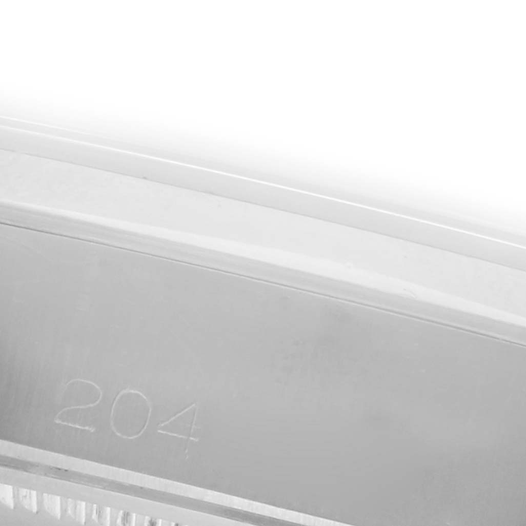 The image shows a close-up view of the bezel edge with an engraved number, likely from a Rolex Date 6694 Men's Stainless Steel Silver Dial 6694 Men's Stainless Steel Silver Dial watch.