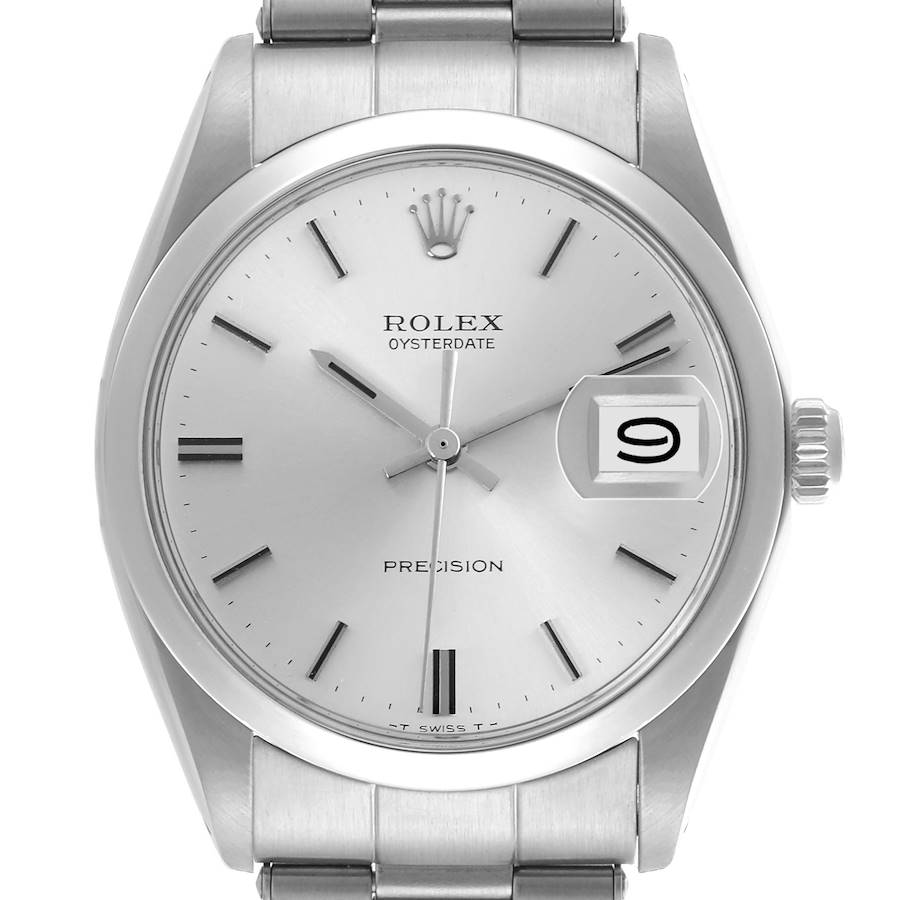 The Rolex Date model watch is shown from a front angle, displaying the dial, hands, date window, and part of the bracelet.