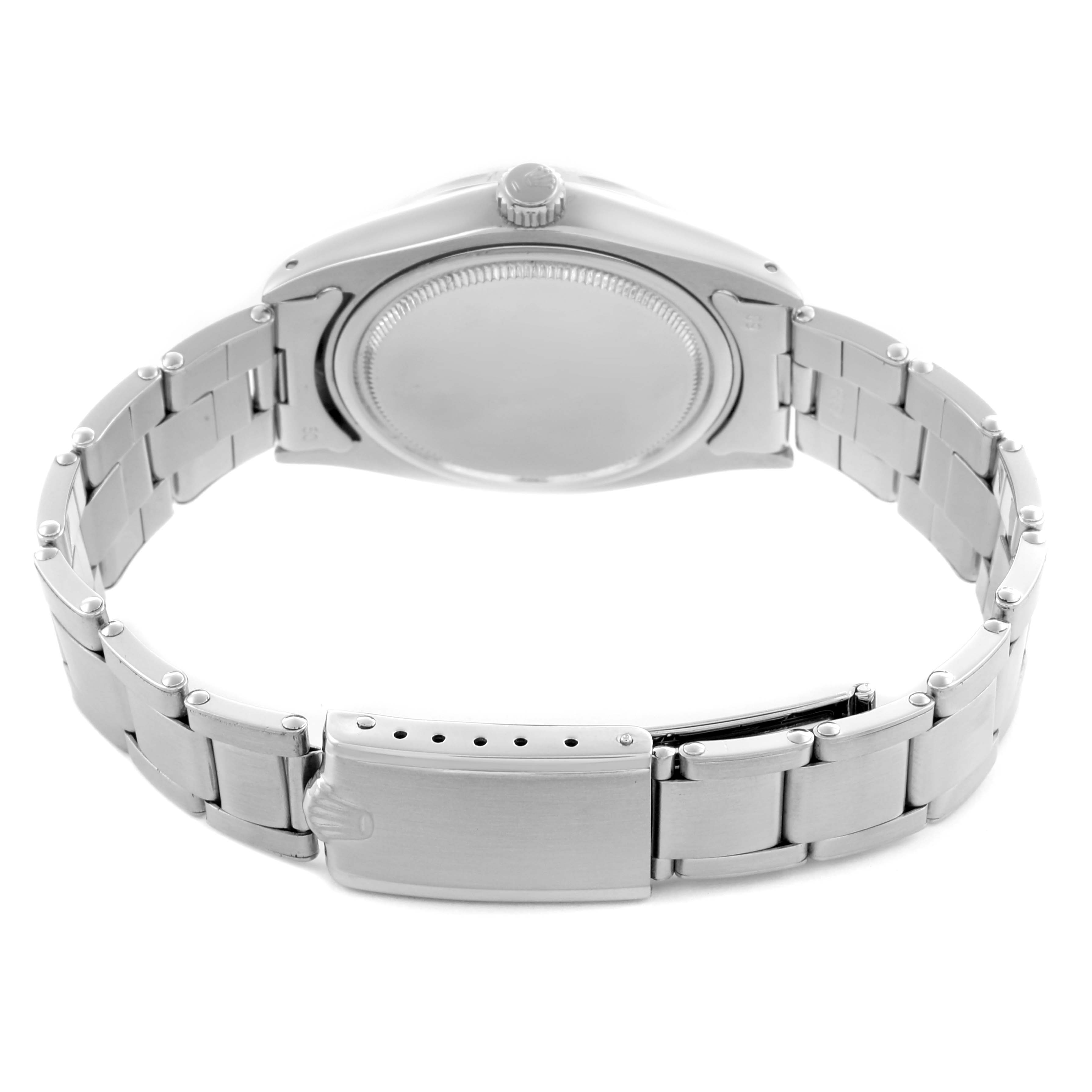 The image shows the back view of a Rolex Date 6694 Men's Stainless Steel Silver Dial 6694 Men's Stainless Steel Silver Dial watch, highlighting the case back, bracelet, and clasp.