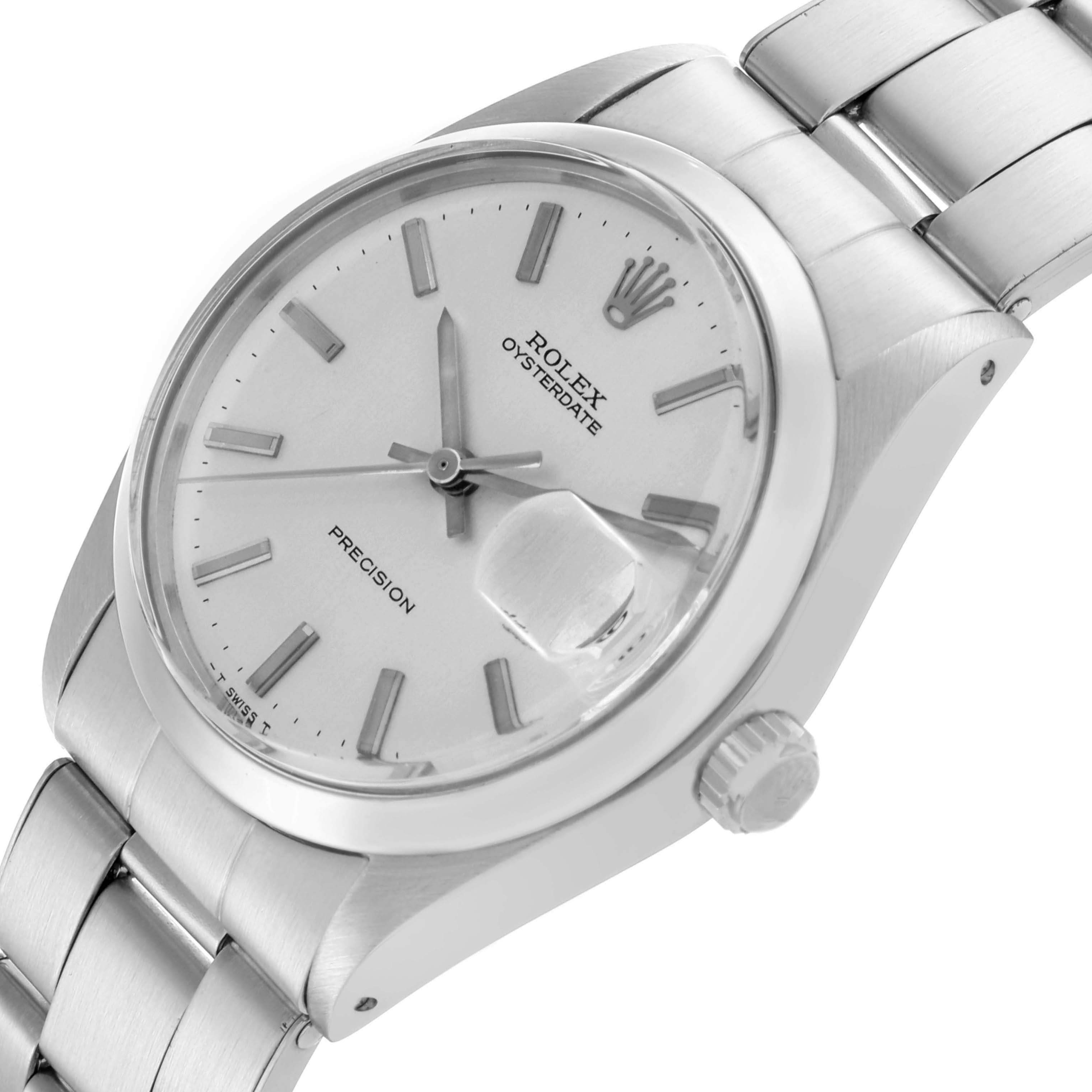 The Rolex Date 6694 Men's Stainless Steel Silver Dial 6694 Men's Stainless Steel Silver Dial model watch is shown from a front angle, highlighting the dial, cyclops lens, bezel, bracelet, and crown.