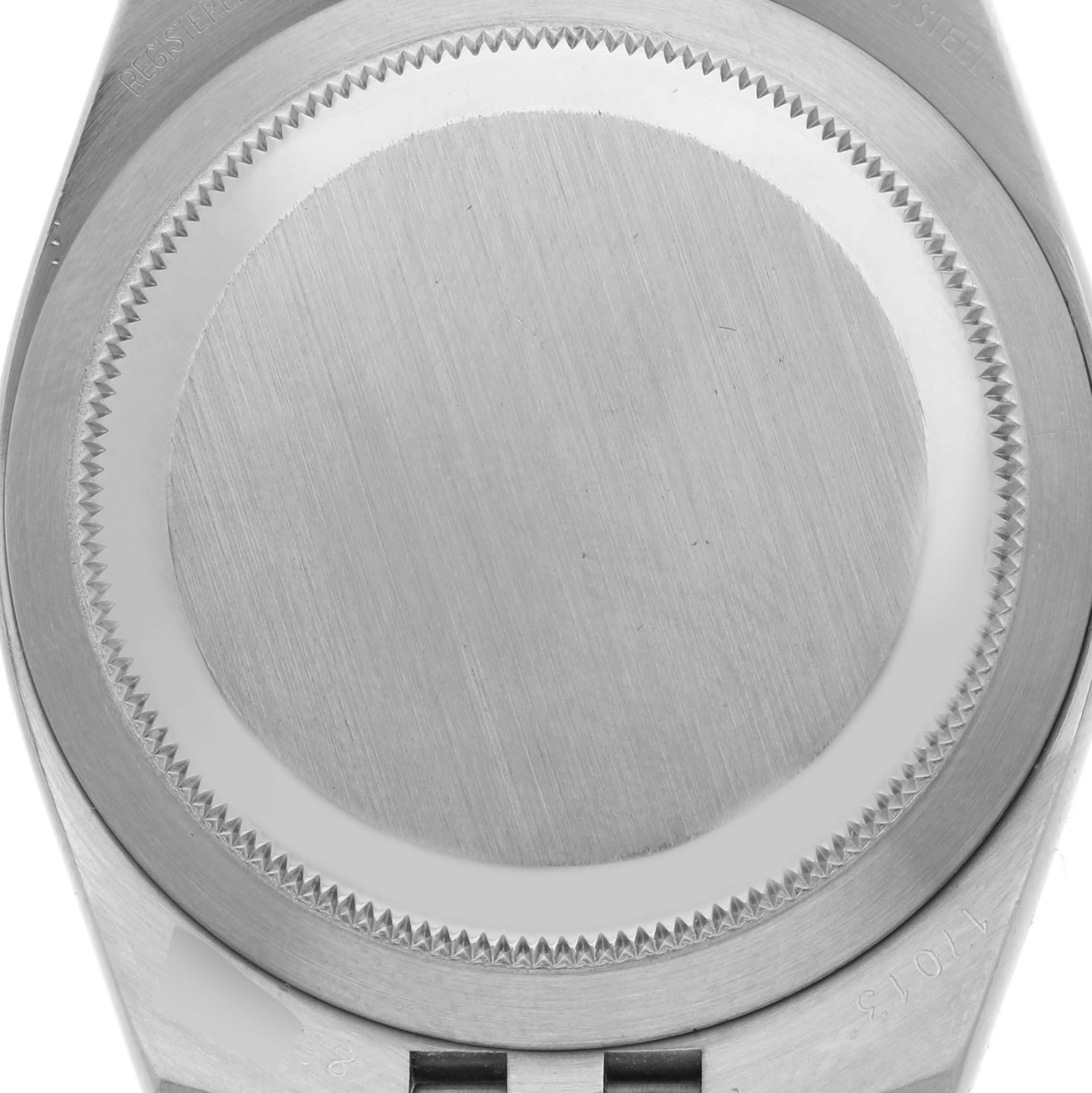 The image shows the case back of a Rolex Oysterquartz 17013 Men's Steel and Gold (two tone) Champagne Dial 17013 Men's Steel and Gold (two tone) Champagne Dial watch, viewed from a direct overhead angle.