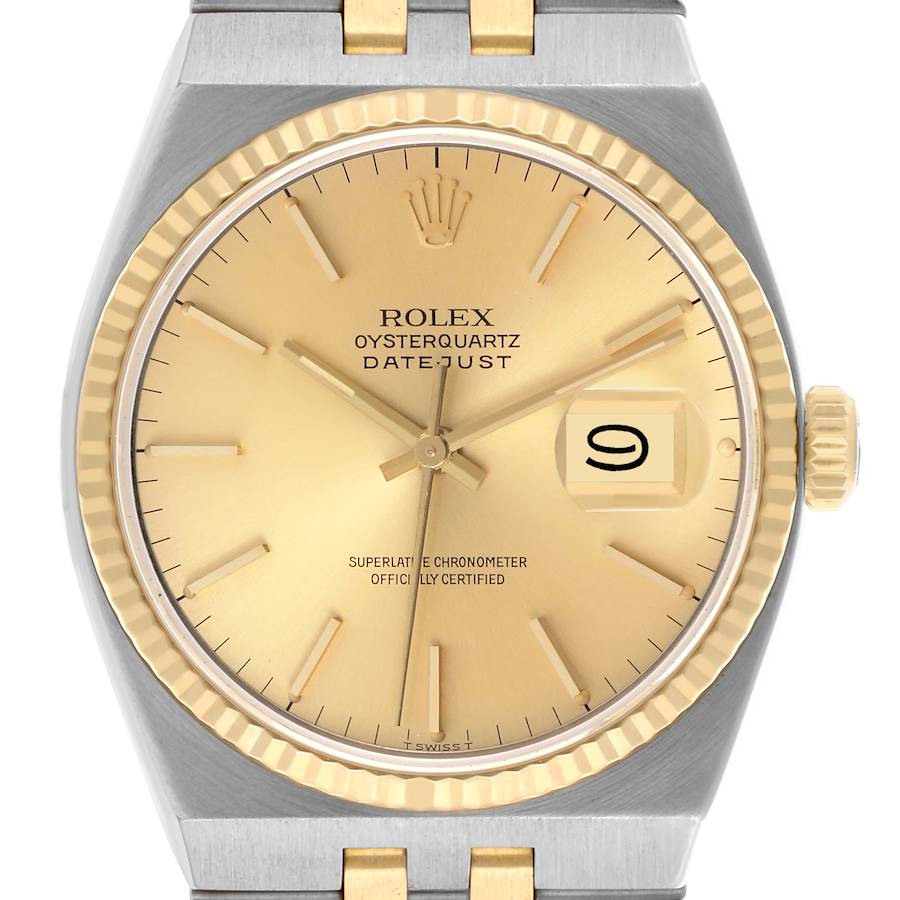 The Rolex Oysterquartz watch is shown from the front, highlighting the gold dial, date window, and fluted bezel.