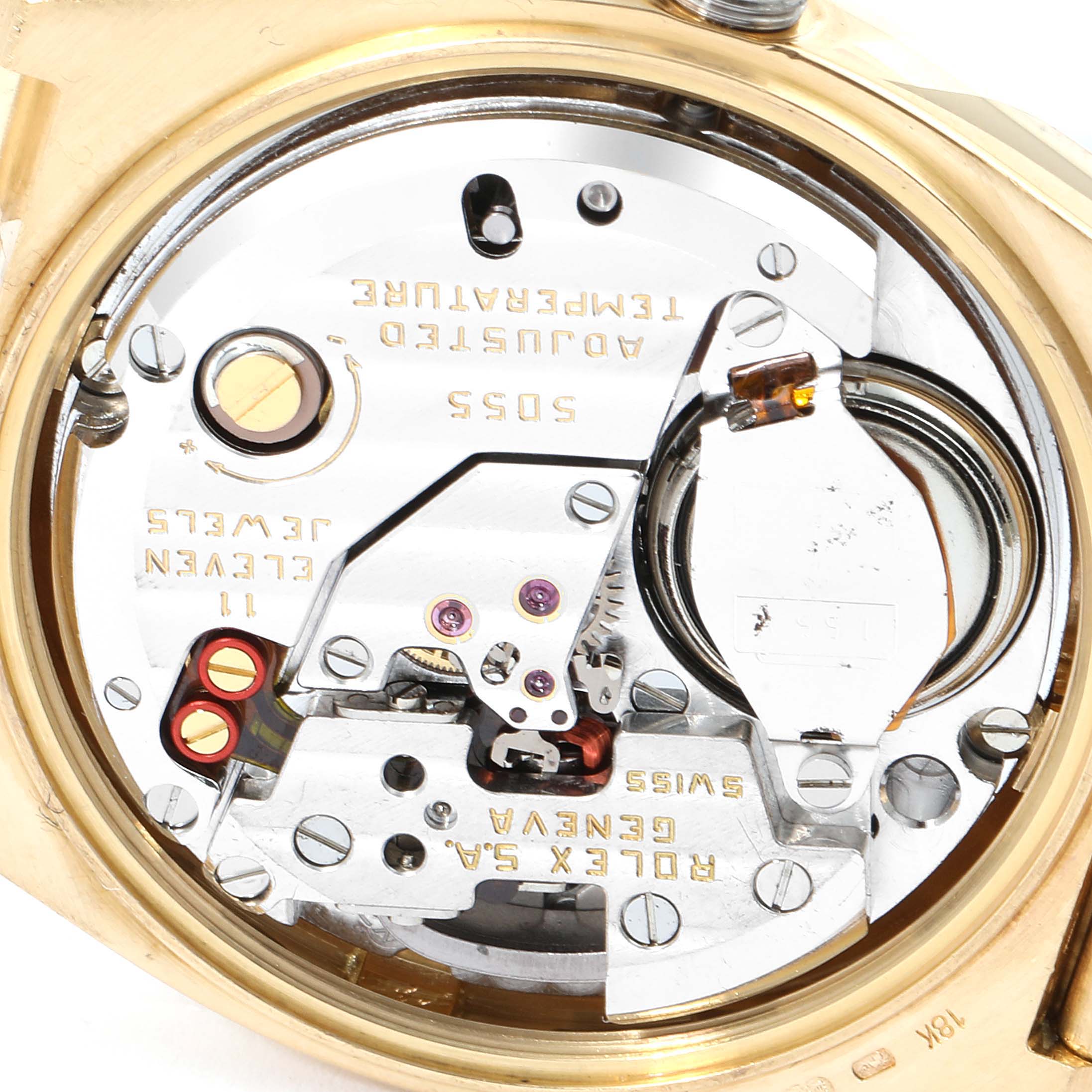 This image shows the internal movement and components of a Rolex Oysterquartz 19018 Men's Yellow Gold Champagne Dial 19018 Men's Yellow Gold Champagne Dial watch from a top-down angle.