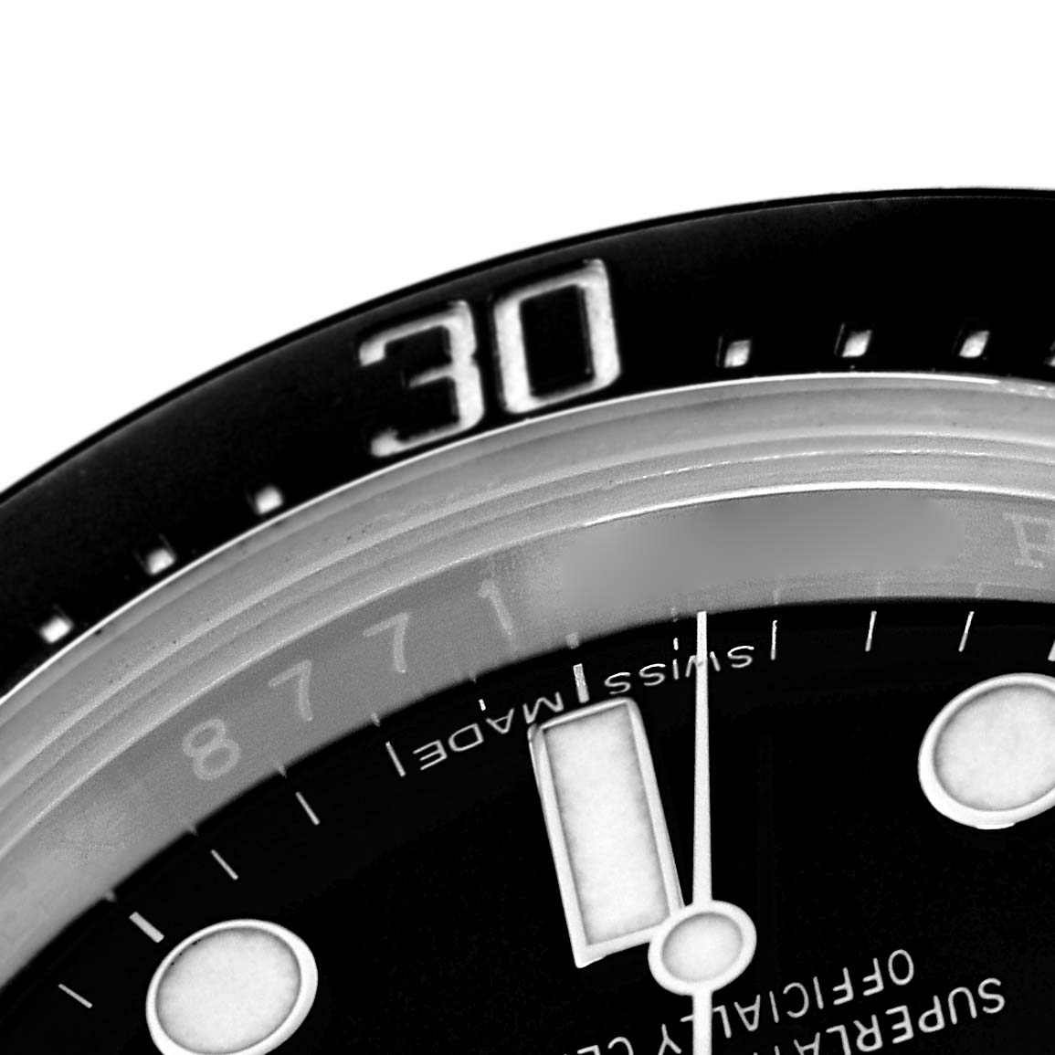 The image shows a close-up of the Rolex Sea-Dweller 116600 Men's Stainless Steel Black Dial 116600 Men's Stainless Steel Black Dial bezel and part of the dial.