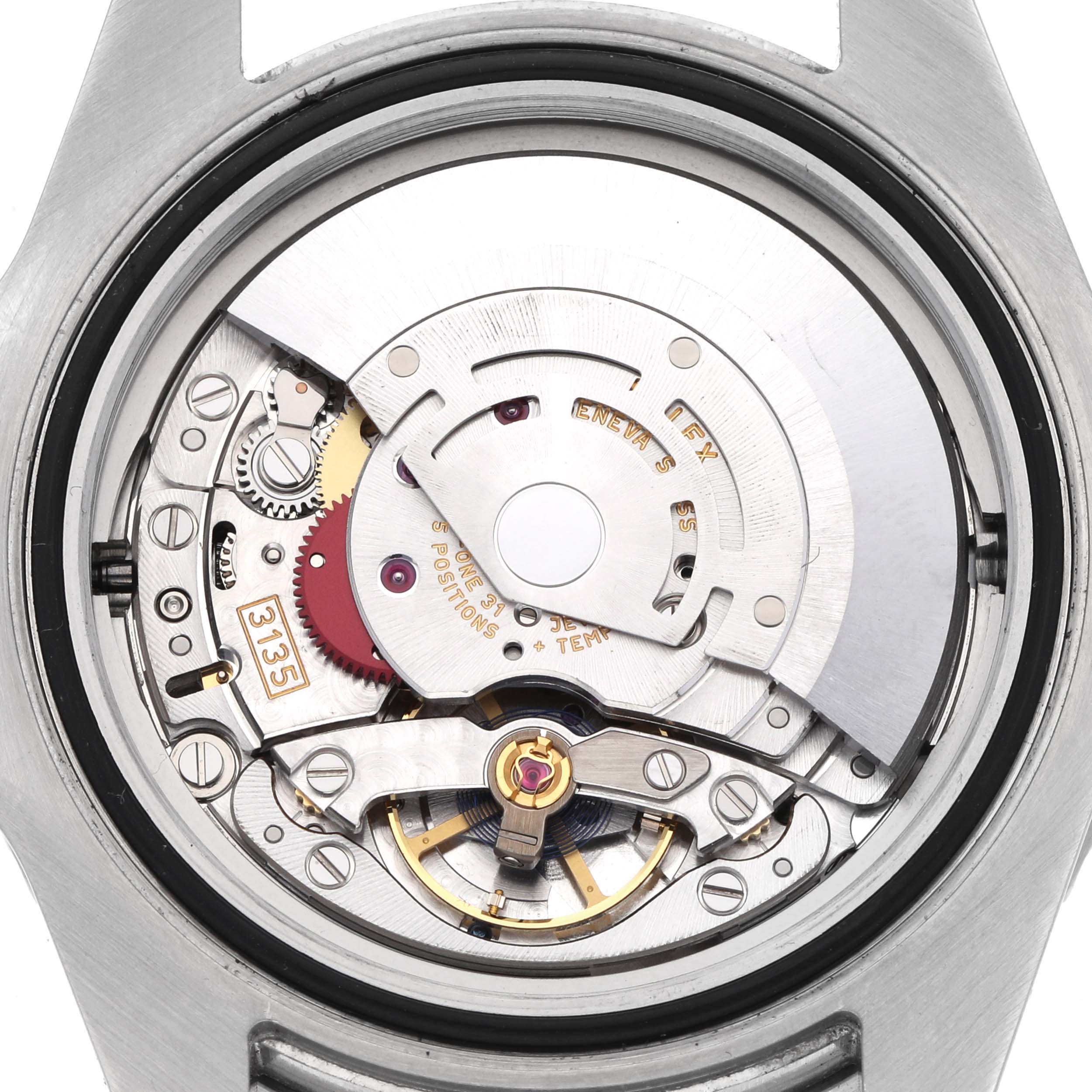 The image shows the back view of a Rolex Sea-Dweller 116600 Men's Stainless Steel Black Dial 116600 Men's Stainless Steel Black Dial watch, highlighting its intricate internal movement mechanism.