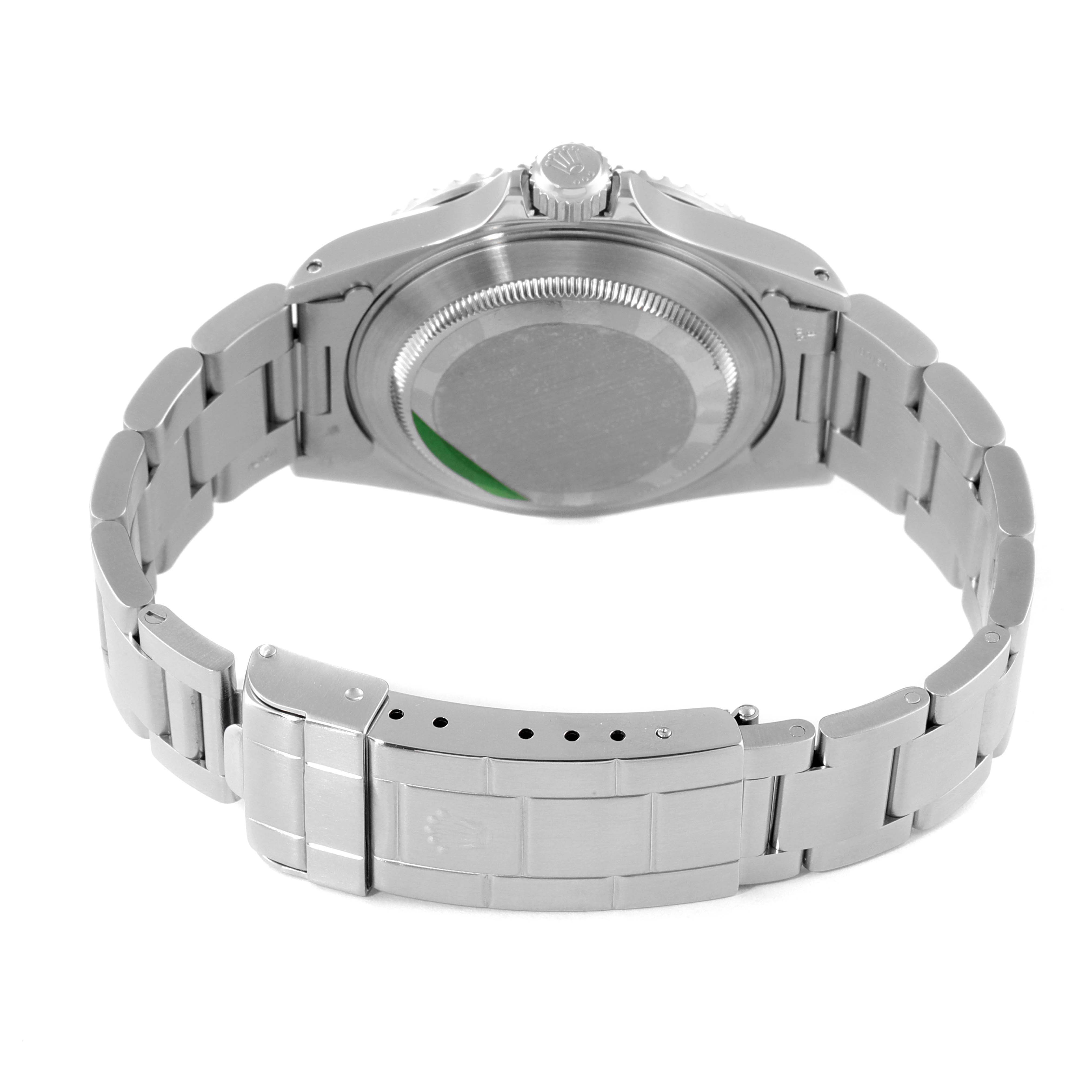 The image shows the backside and clasp of a Rolex Submariner 14060 Men
s Stainless Steel Black Dial 14060 Men
s Stainless Steel Black Dial watch from a low angle.