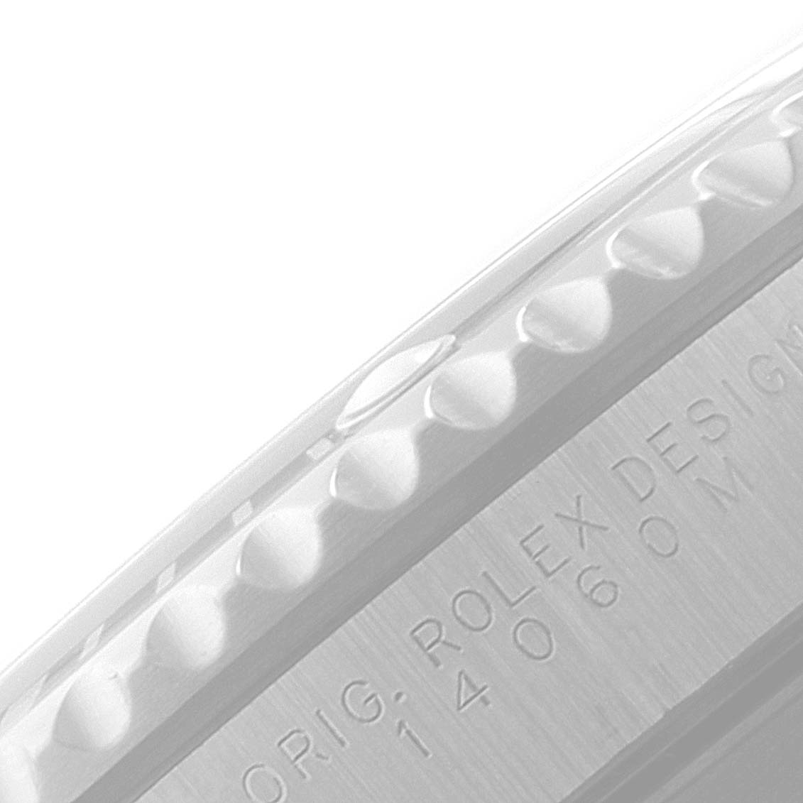 This image shows a close-up angle of the bezel and engraved side of the case of a Rolex Submariner 14060 Men
s Stainless Steel Black Dial 14060 Men
s Stainless Steel Black Dial watch.