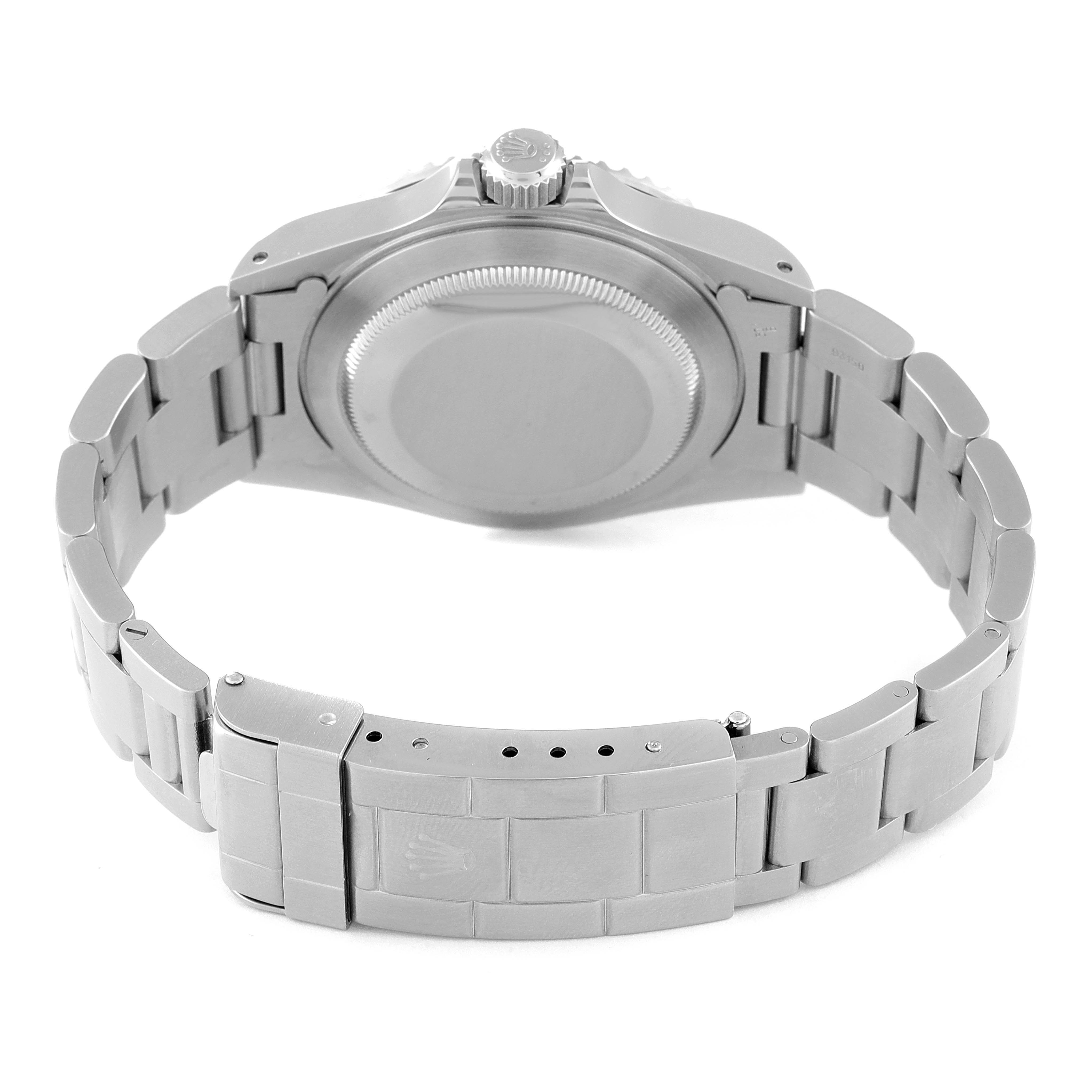 This image shows the back case, crown, and bracelet clasp of a Rolex Submariner 14060 Men
s Stainless Steel Black Dial 14060 Men
s Stainless Steel Black Dial watch from a rear angle.