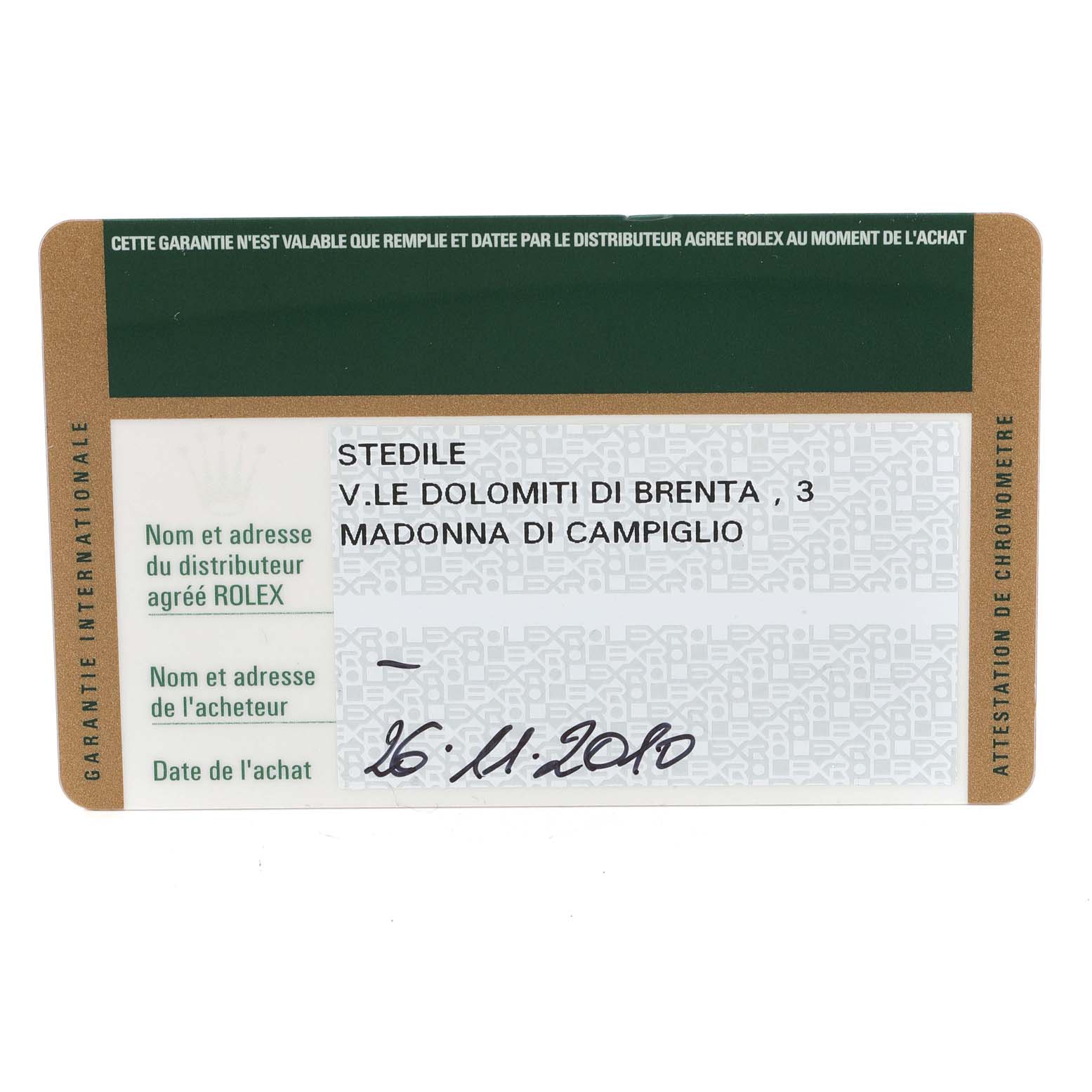 This image shows a warranty card for a Rolex Submariner 14060 Men
s Stainless Steel Black Dial 14060 Men
s Stainless Steel Black Dial, detailing the purchase and distributor information.