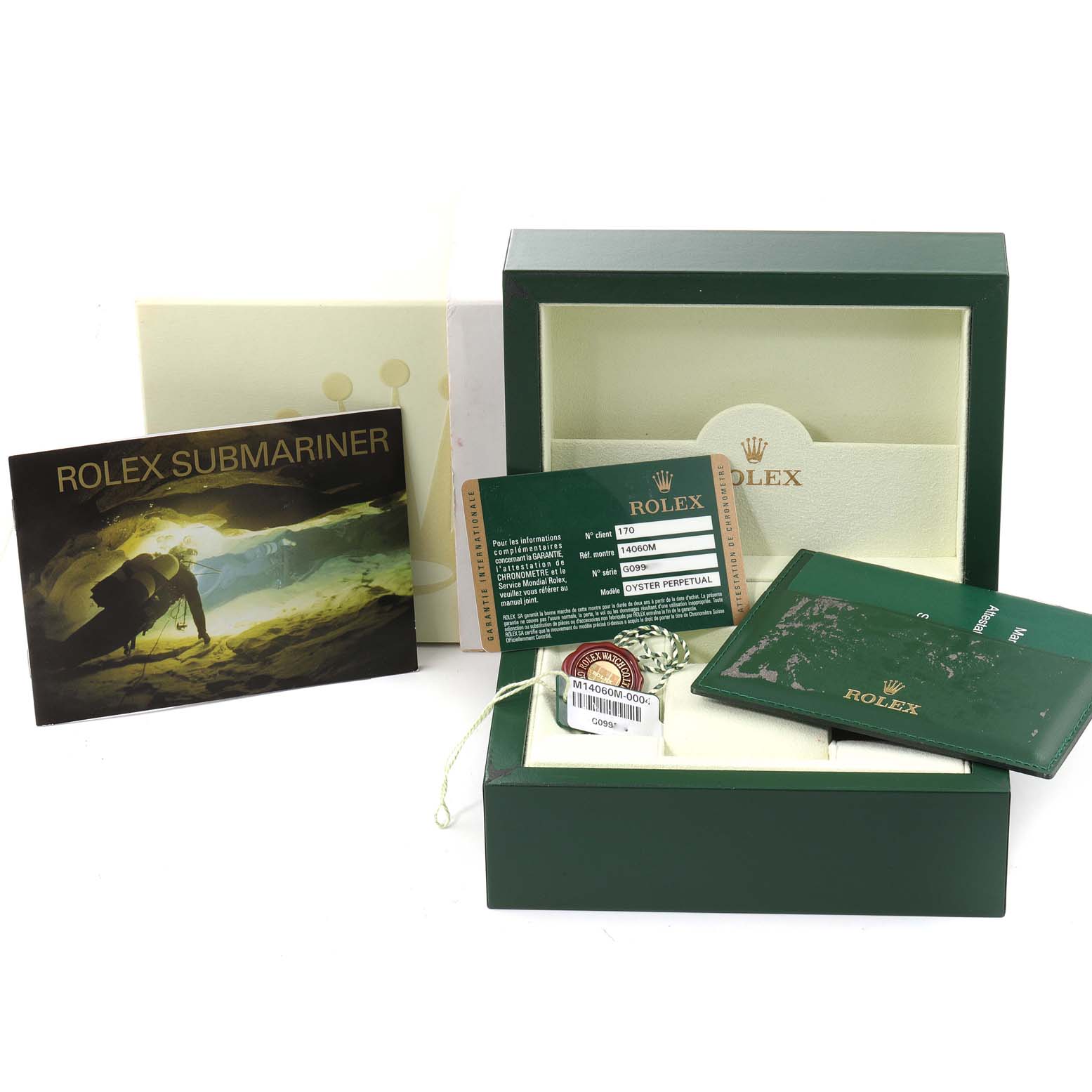 The image shows the packaging, warranty card, booklet, and accessories for the Rolex Submariner 14060 Men
s Stainless Steel Black Dial 14060 Men
s Stainless Steel Black Dial model.