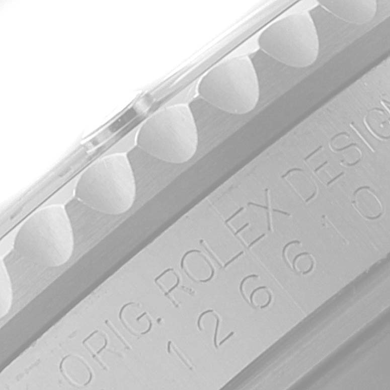 This image shows a close-up angle of the engraved side of a Rolex Submariner 126610 Men's Stainless Steel Black Dial 126610 Men's Stainless Steel Black Dial watch bezel.