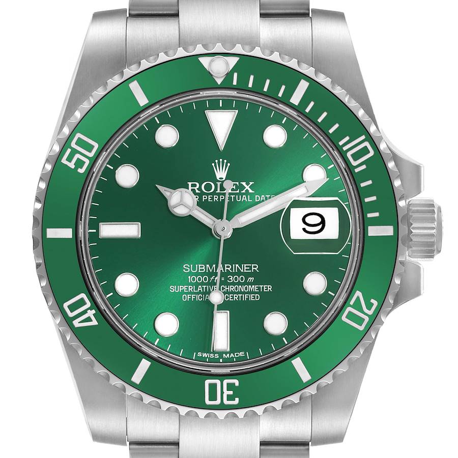 The image shows a front view of a Rolex Submariner, displaying its green dial, bezel, crown, and bracelet.