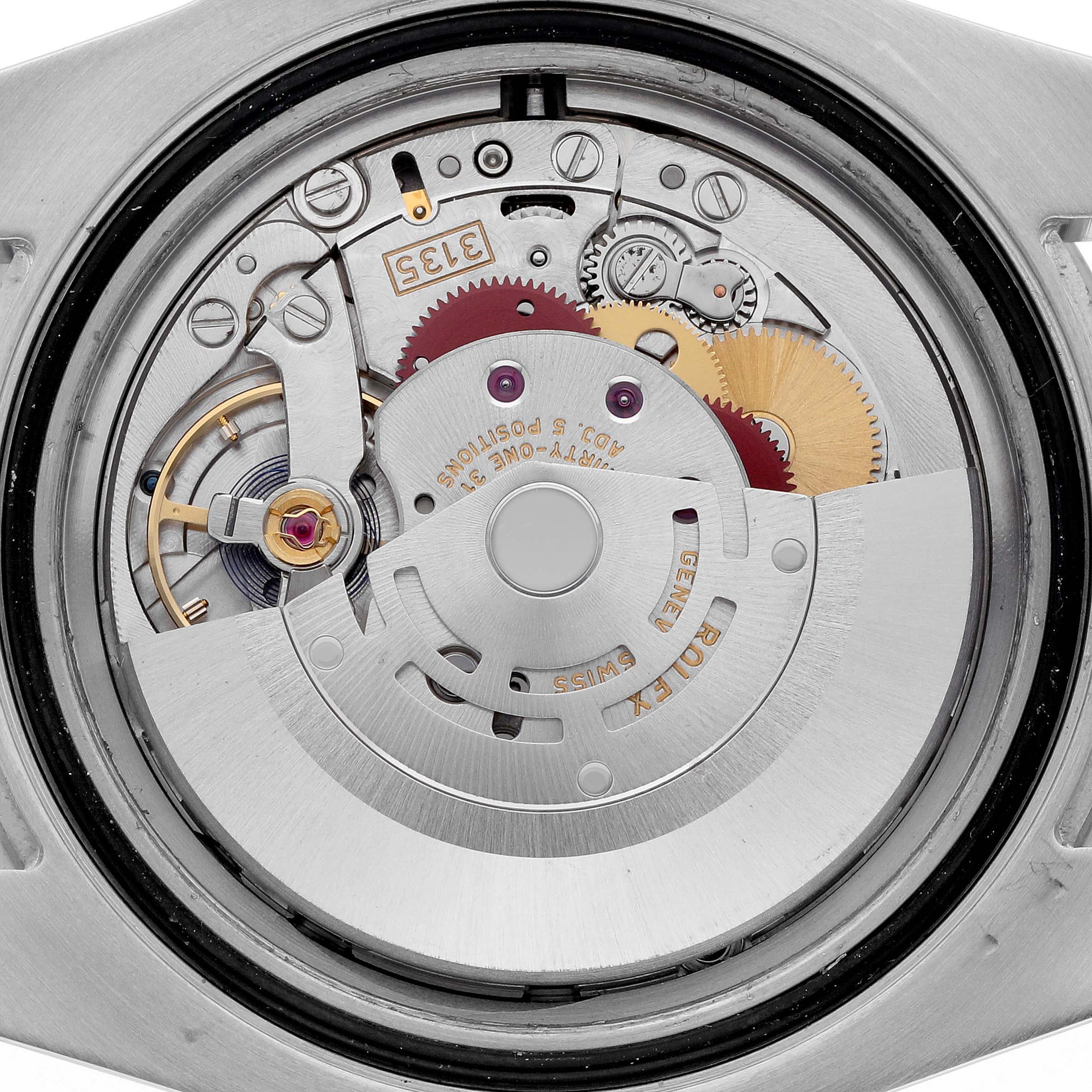 The image shows the movement mechanism of a Rolex Submariner 116610LV Men's Stainless Steel Green Dial 116610LV Men's Stainless Steel Green Dial watch viewed from the back, with visible gears and rotor.