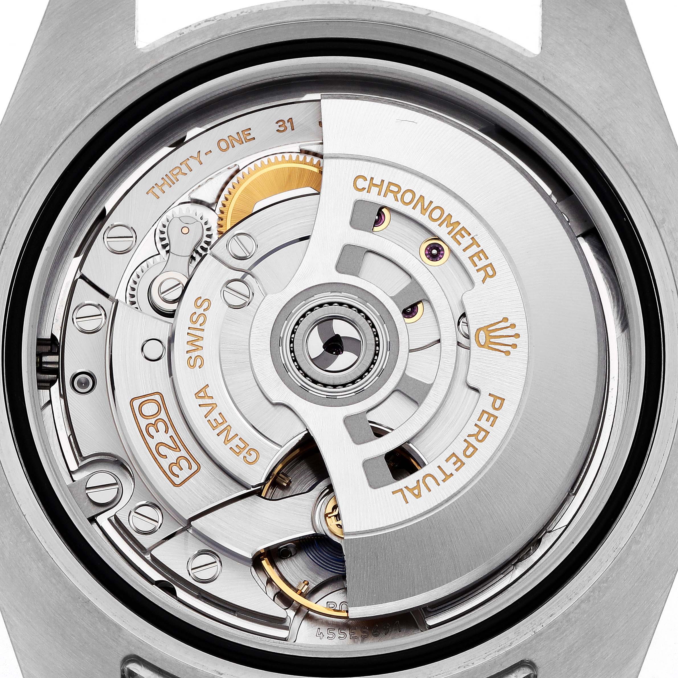 This image shows a close-up of the Rolex Submariner 124060 Men's Stainless Steel Black Dial 124060 Men's Stainless Steel Black Dial's movement, highlighting its intricate mechanical components.