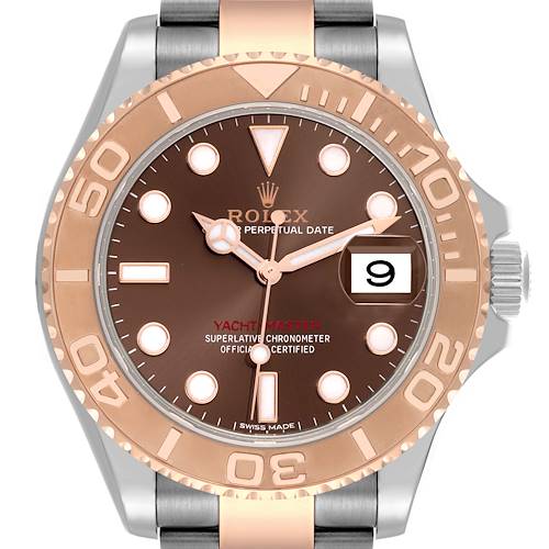 The Rolex Yacht-Master is shown from a top view, highlighting the dial, bezel, and bracelet.