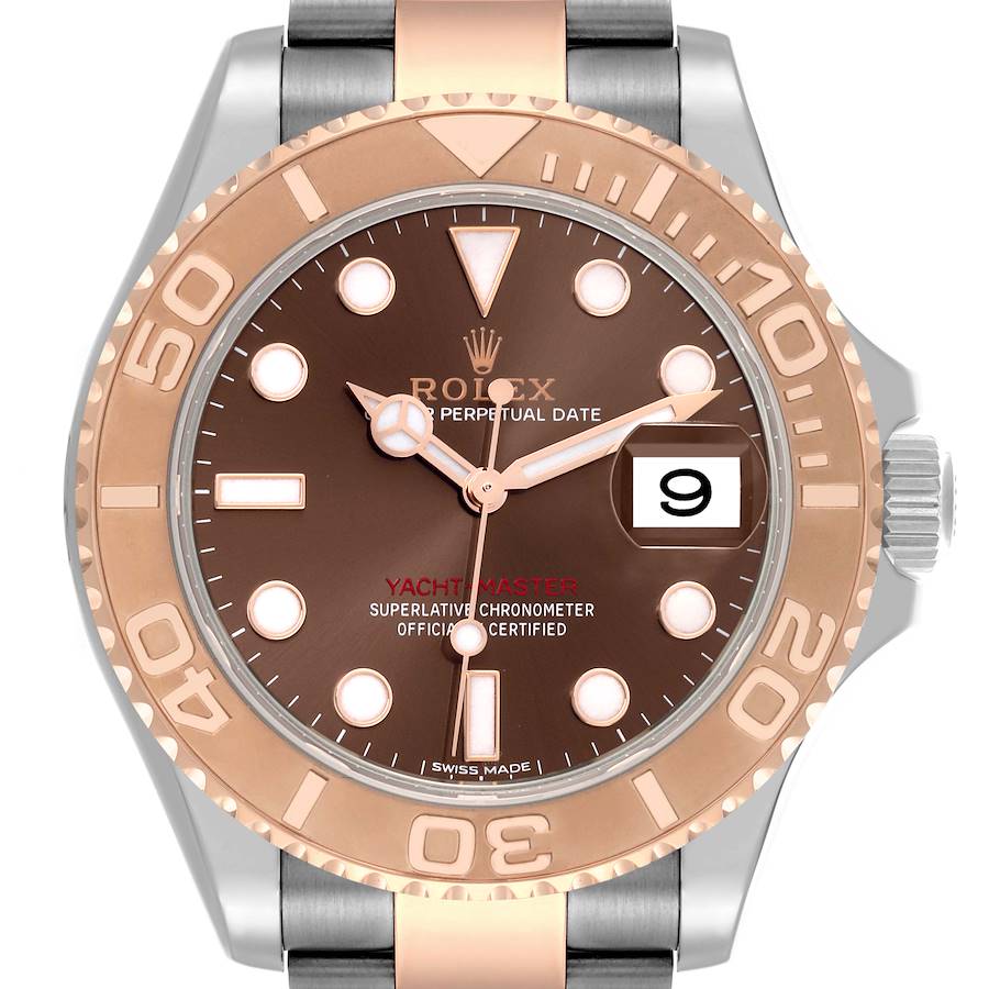 The image shows a front view of the Rolex Yacht-Master watch, highlighting its brown dial, bezel, and date feature.