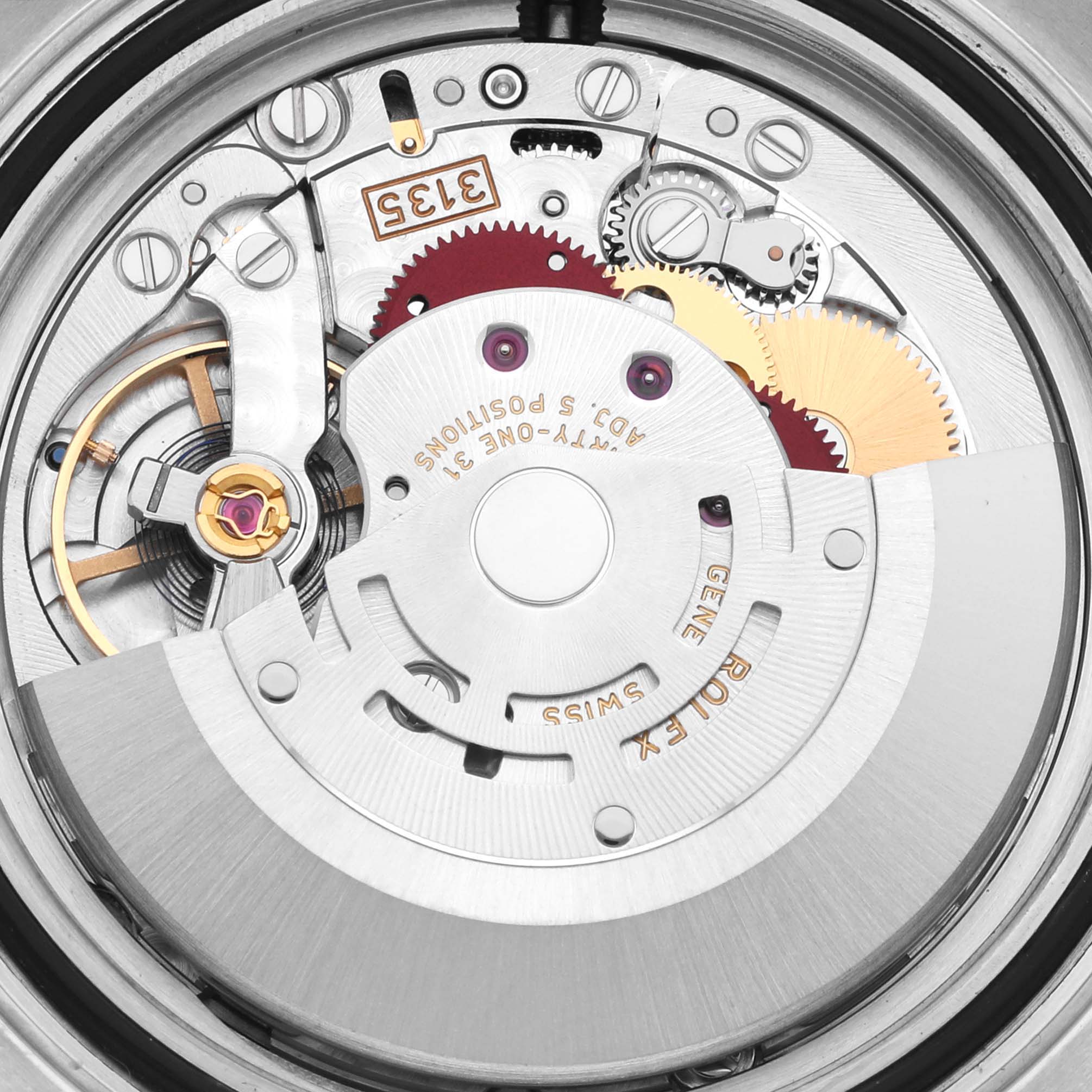 The image shows the intricate movement of a Rolex Yacht-Master 116621 Men's Steel and Gold (two tone) Brown Dial 116621 Men's Steel and Gold (two tone) Brown Dial watch from a close-up, top-down angle.