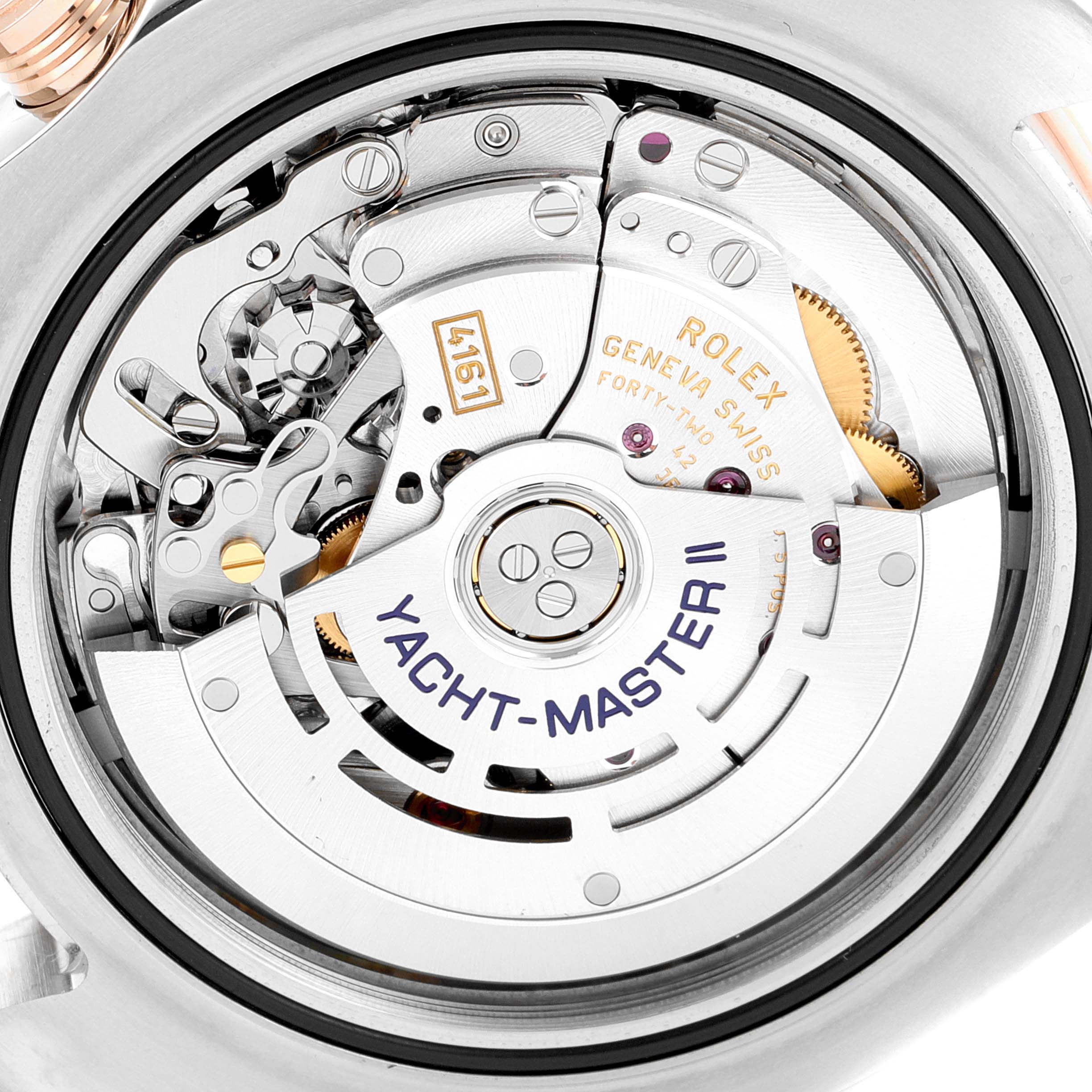 The close-up image shows the intricate inner mechanical movement of a Rolex Yacht-Master 116681 Men's Stainless Steel White Dial 116681 Men's Stainless Steel White Dial watch.