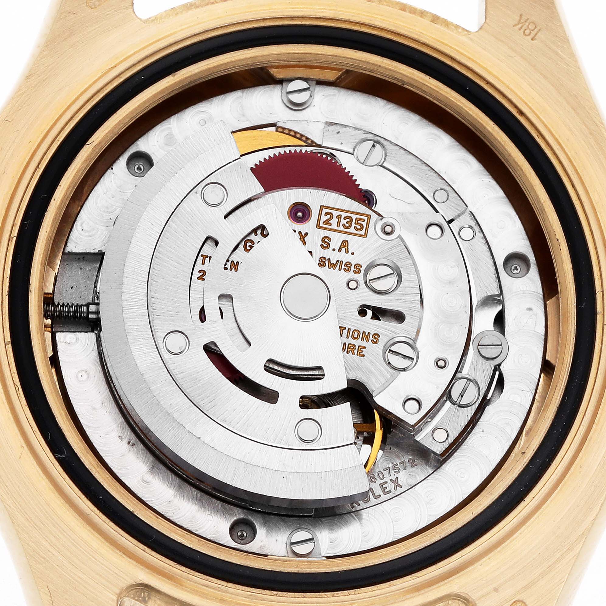 The image shows the internal movement of a Rolex Yacht-Master 68628 Men's Yellow Gold White Dial 68628 Men's Yellow Gold White Dial, viewed from the back, highlighting the rotor and mechanical components.