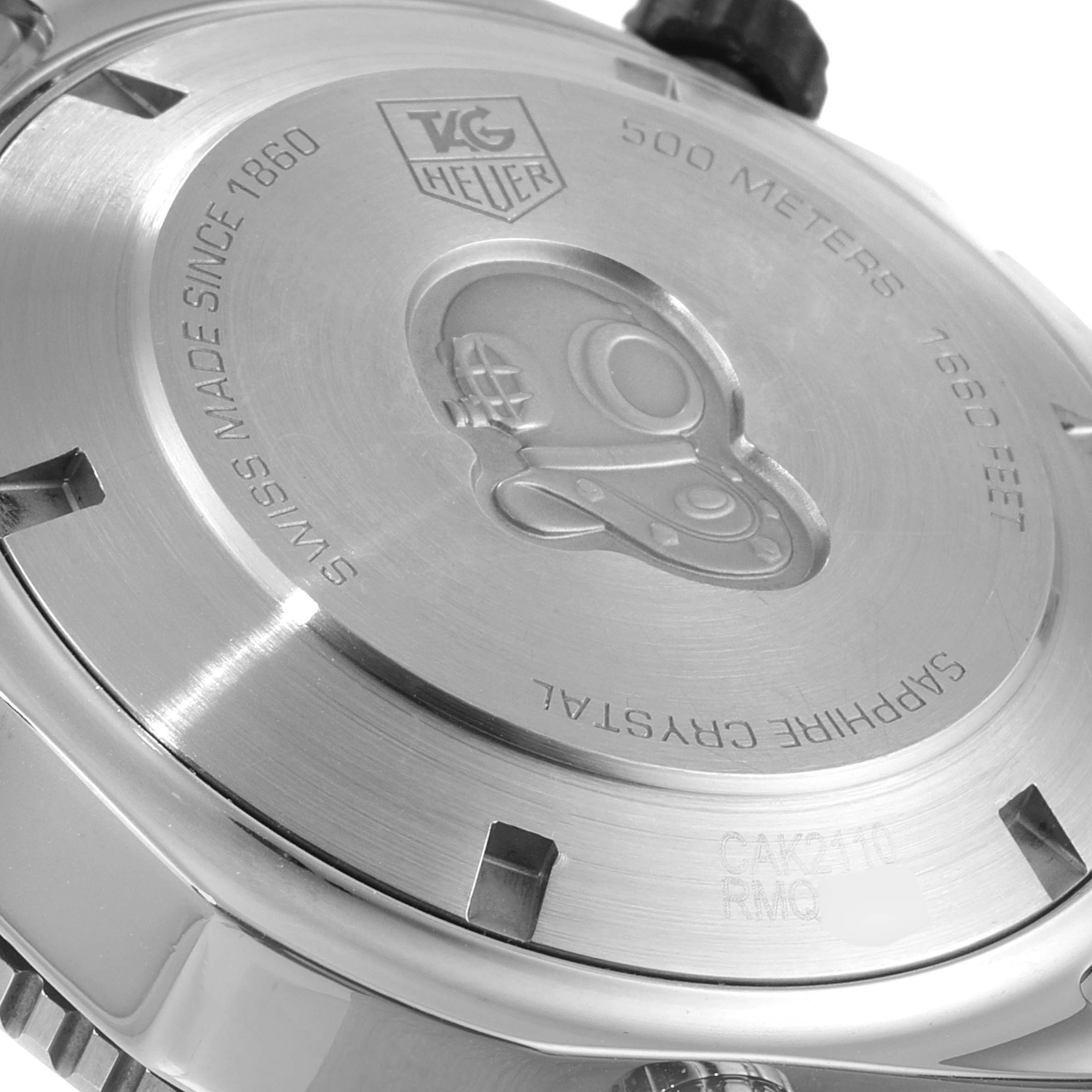 The image shows the back case of the Tag Heuer Aquaracer CAK2110.BA0833 Men
s Stainless Steel Black Dial CAK2110.BA0833 Men
s Stainless Steel Black Dial watch, highlighting the logo, water resistance, and sapphire crystal details.