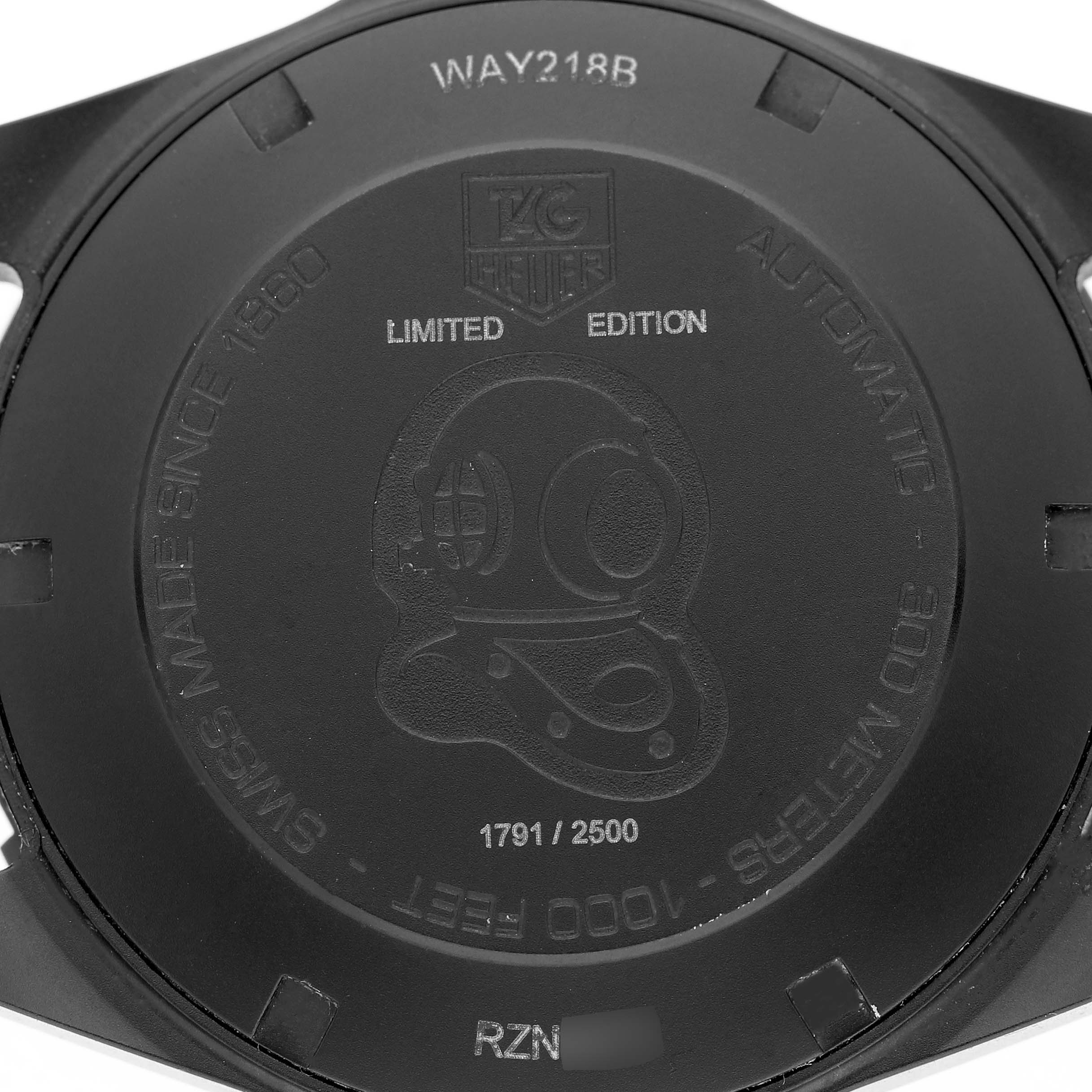 This image shows the back case of the Tag Heuer Aquaracer WAY218B.FC6364 Men's Stainless Steel Black Dial WAY218B.FC6364 Men's Stainless Steel Black Dial, featuring a limited edition engraving and branding.