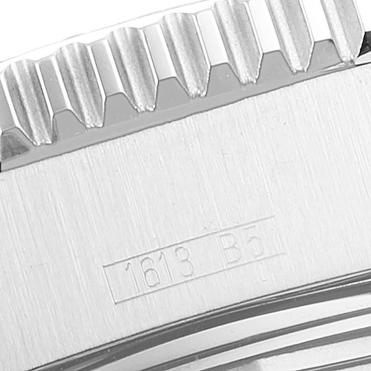 The image shows a close-up of the bezel and case side of the Breitling Superocean A17391 Men's Stainless Steel Black Dial A17391 Men's Stainless Steel Black Dial watch, highlighting its knurled edges and engraved markings.