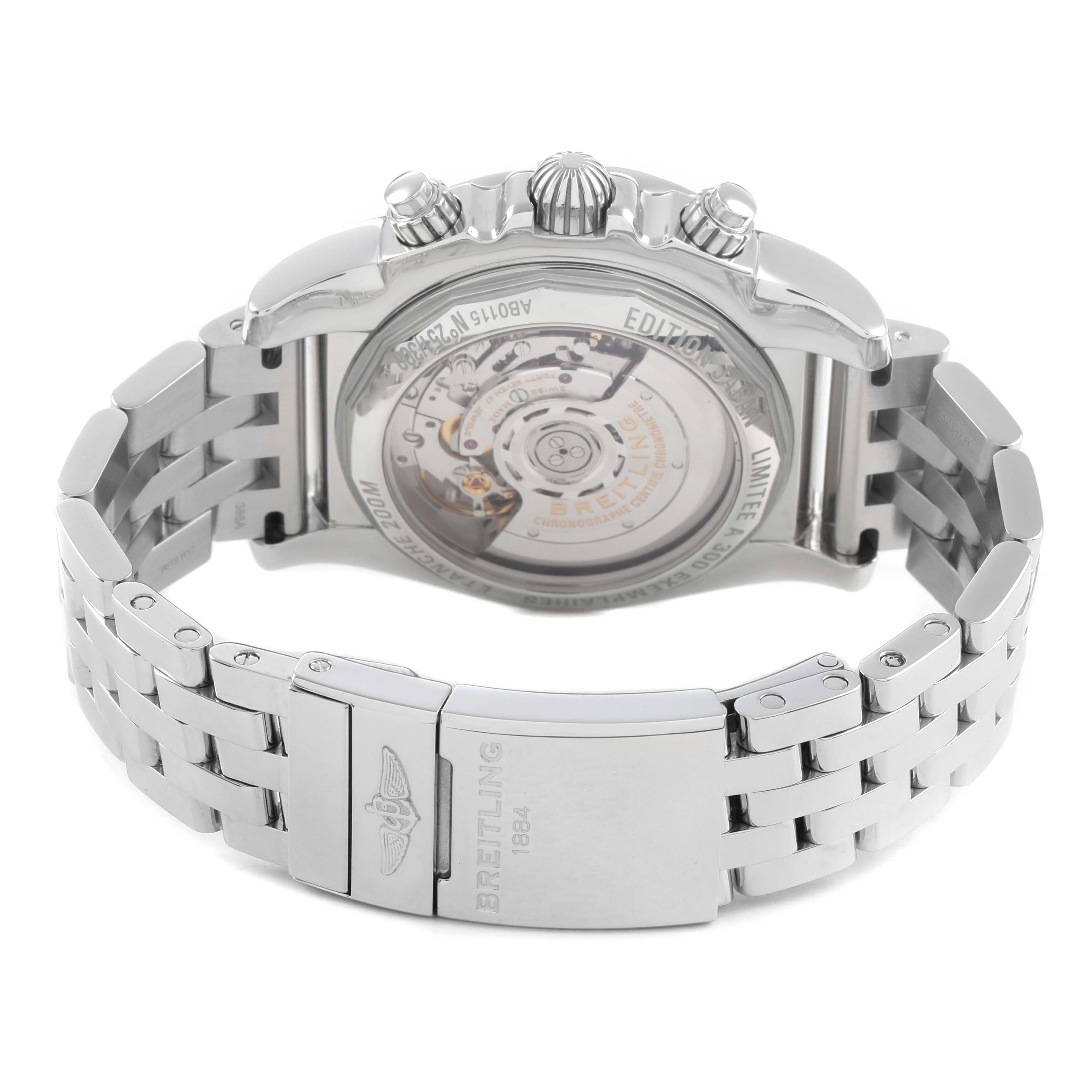 The image shows the back view of a Breitling Chronomat AB0115 Men's Stainless Steel Mother of Pearl Dial, displaying its transparent case back and metal bracelet clasp.
