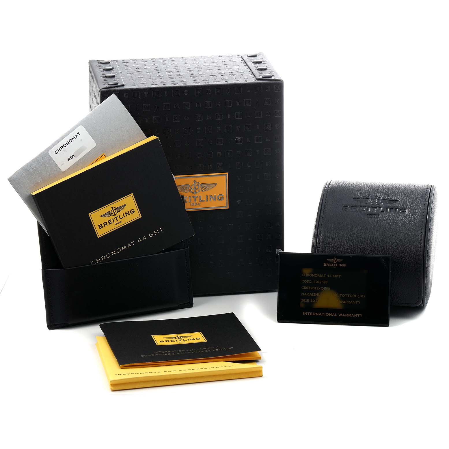 The image shows the Breitling Chronomat CB042012/Q590 Men's Stainless Steel Brown Dial packaging, manuals, warranty card, and a leather case from a high-angle view.