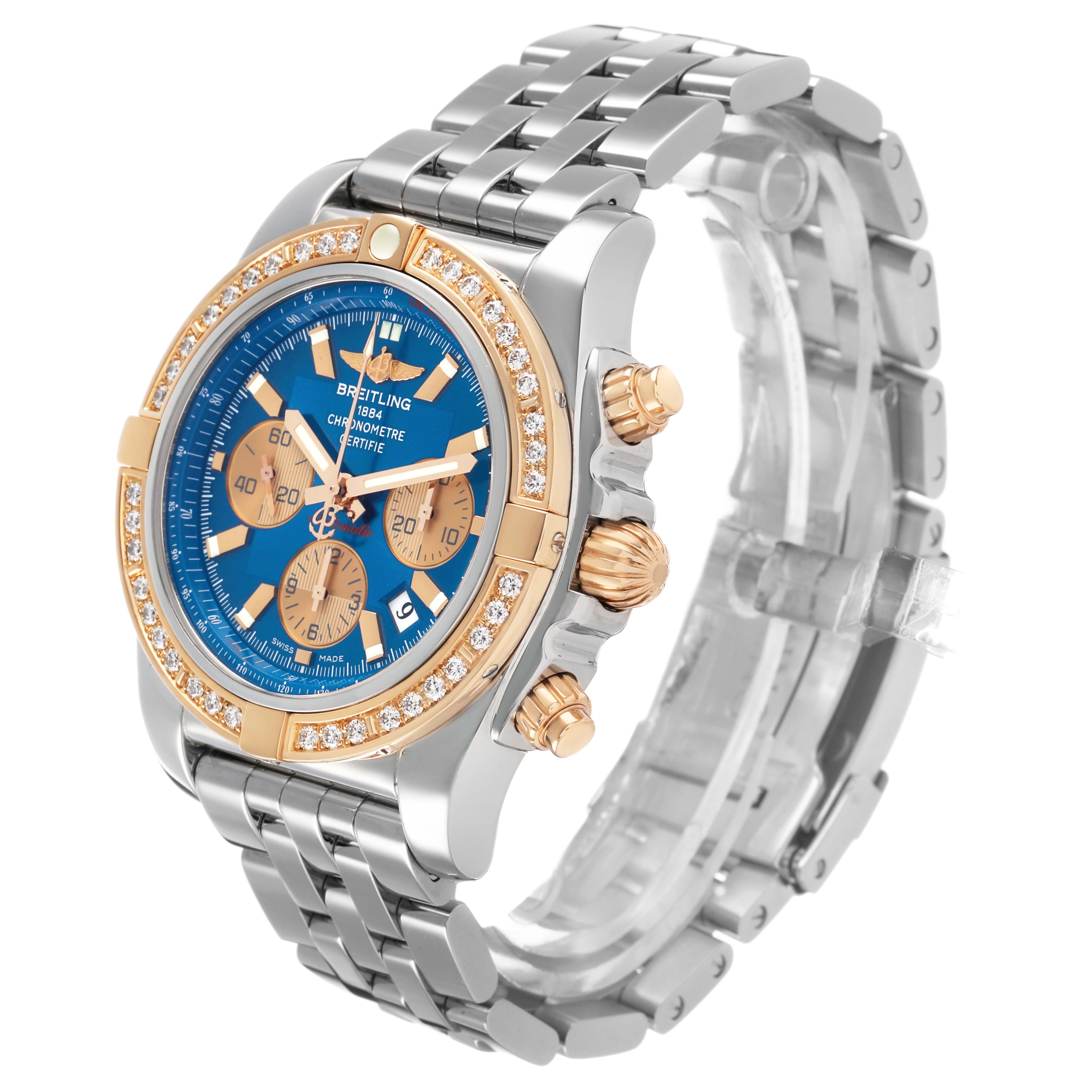 The Breitling Chronomat CB0110 Men's Steel and Gold (two tone) Blue Dial watch is shown at a slight angle, highlighting the face, crown, subdials, and metal band.