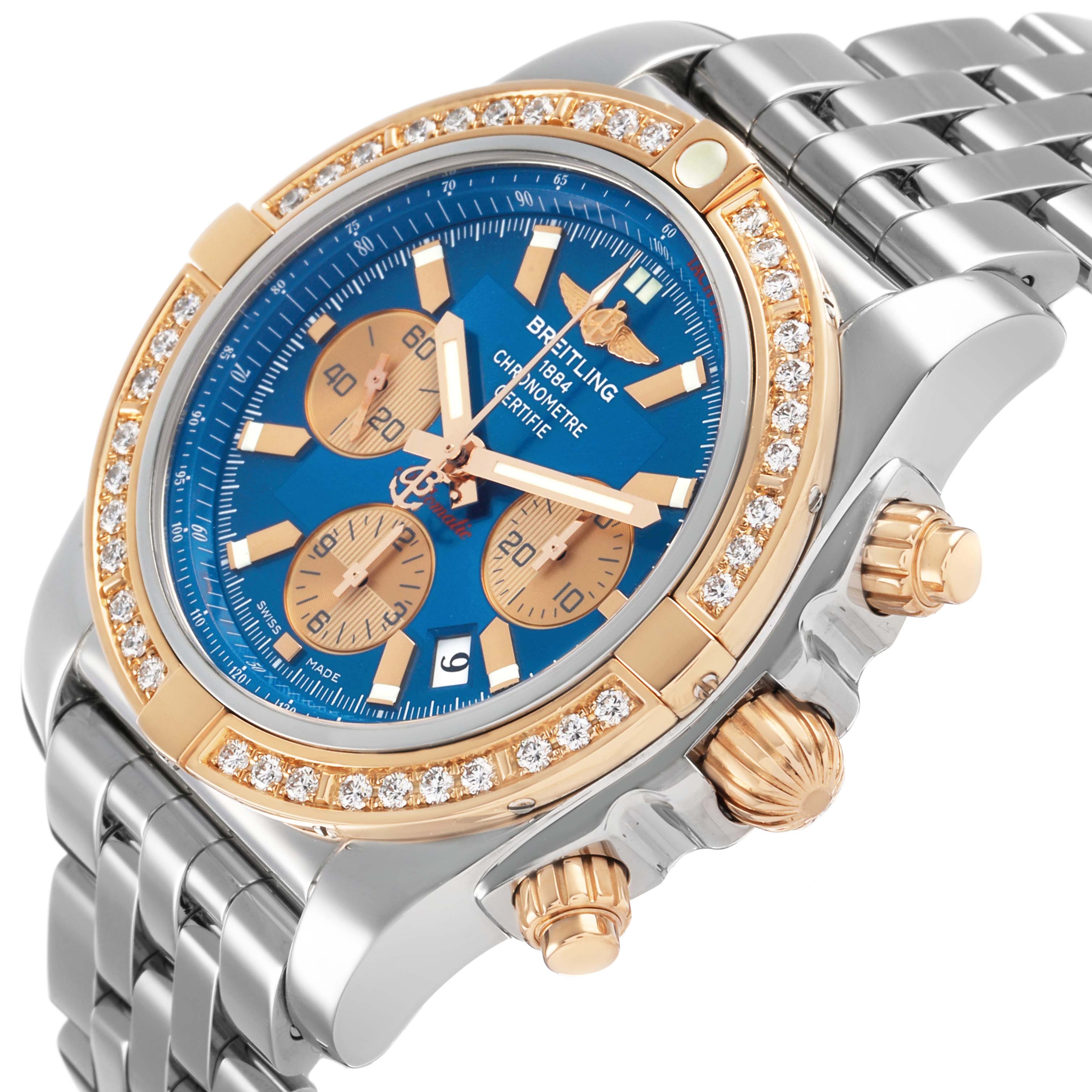 The Breitling Chronomat CB0110 Men's Steel and Gold (two tone) Blue Dial watch is shown at a slight three-quarter angle, highlighting its bezel, crown, and subdials.