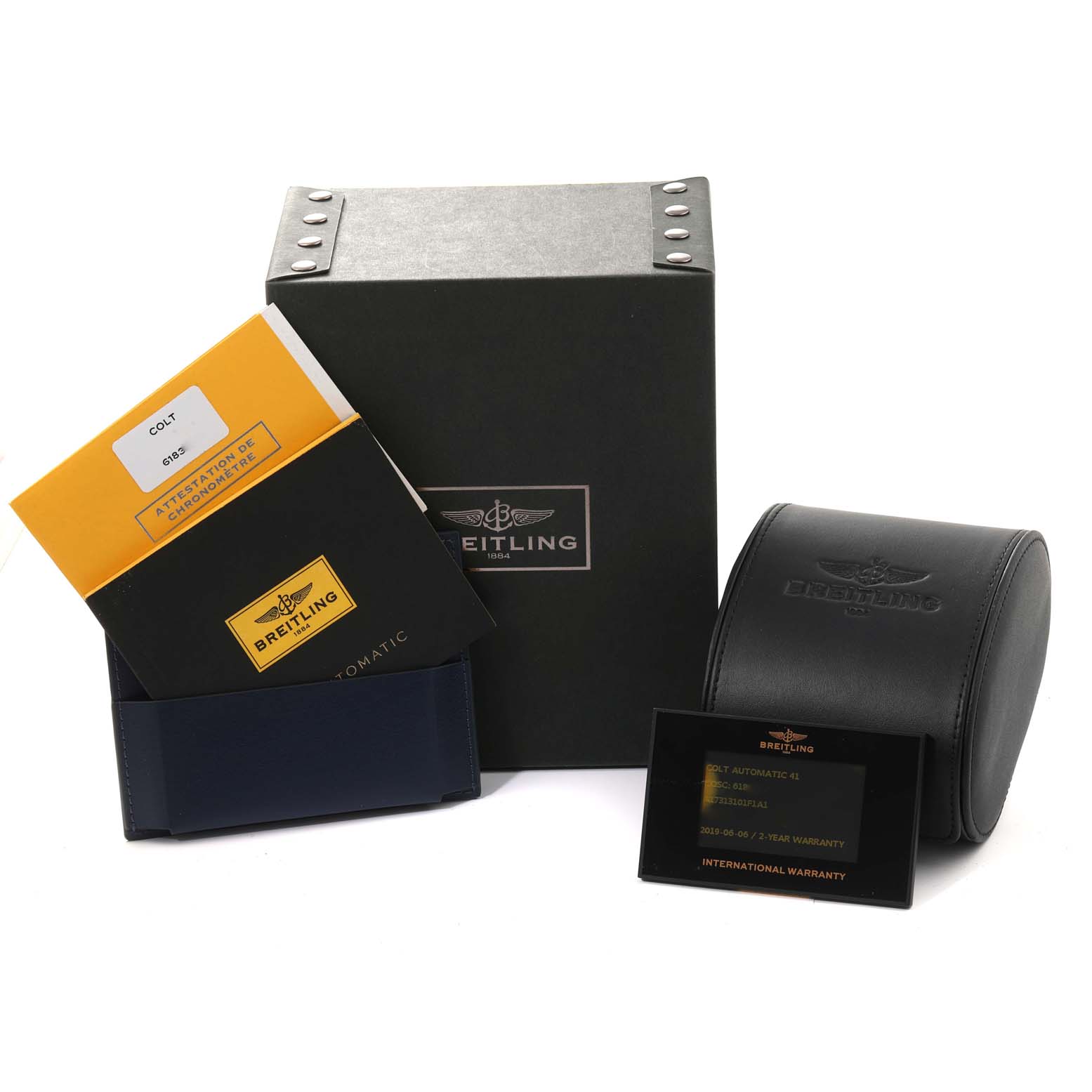 The image shows the Breitling Colt A17313 Men's Stainless Steel Grey Dial A17313 Men's Stainless Steel Grey Dial packaging, manuals, warranty card, and a black carrying case.