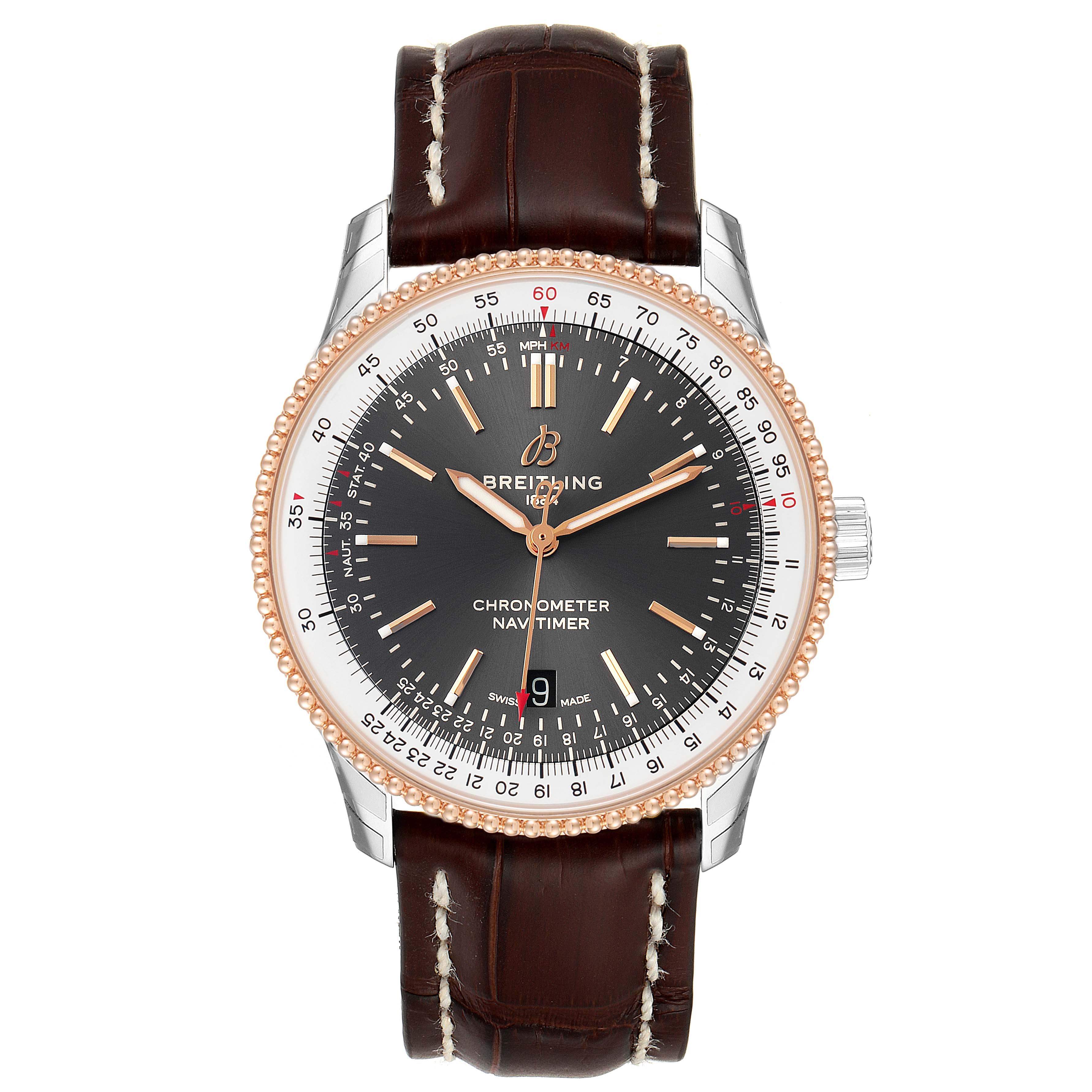 The image shows a front view of a Breitling Navitimer U17326211M1P1 Men's Steel and Gold (two tone) Grey Dial U17326211M1P1 Men's Steel and Gold (two tone) Grey Dial watch, featuring a dark dial, brown leather strap, and rose gold bezel.