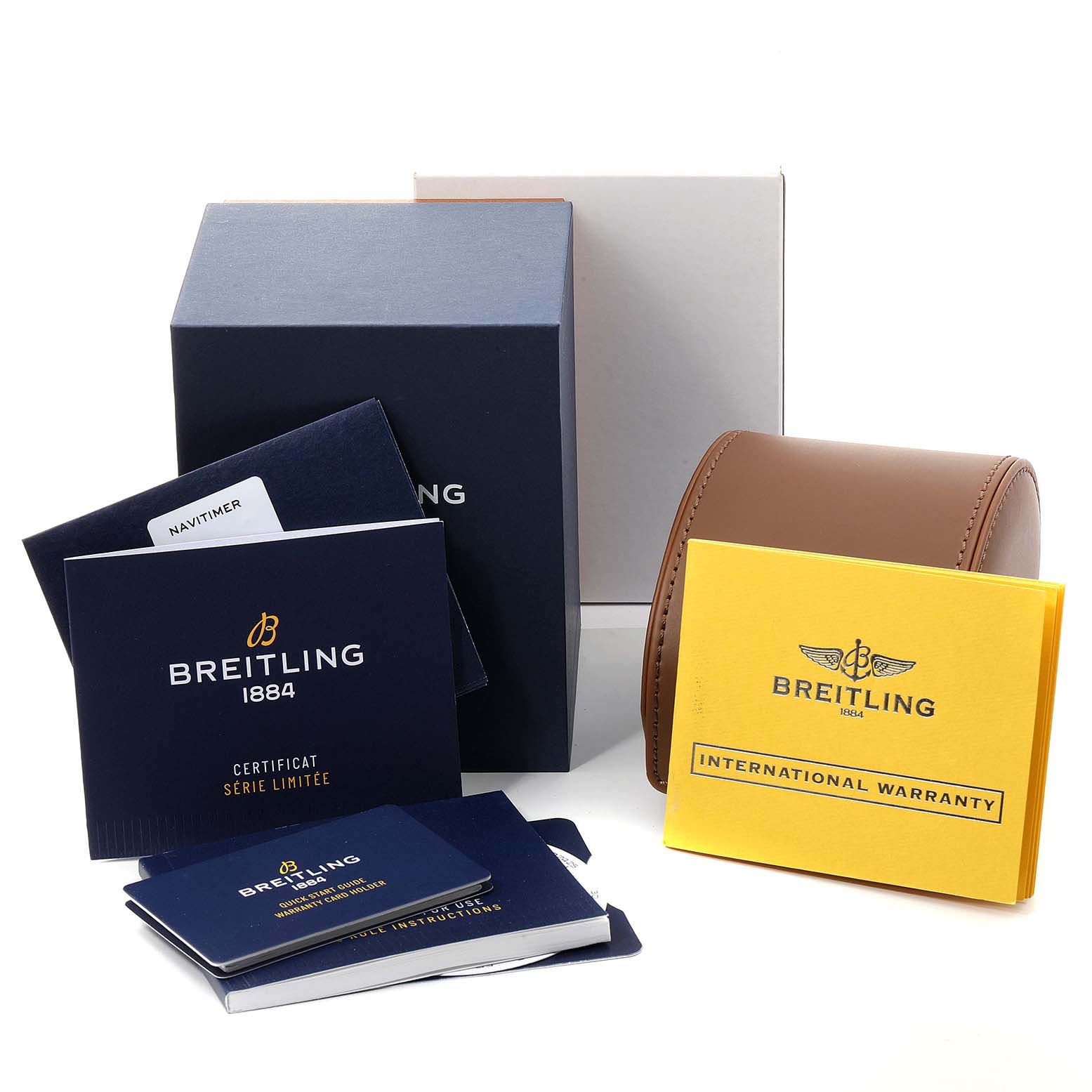 The image shows the packaging and accessories for the Breitling Navitimer U17326211M1P1 Men's Steel and Gold (two tone) Grey Dial U17326211M1P1 Men's Steel and Gold (two tone) Grey Dial, including boxes, manuals, and warranty cards.