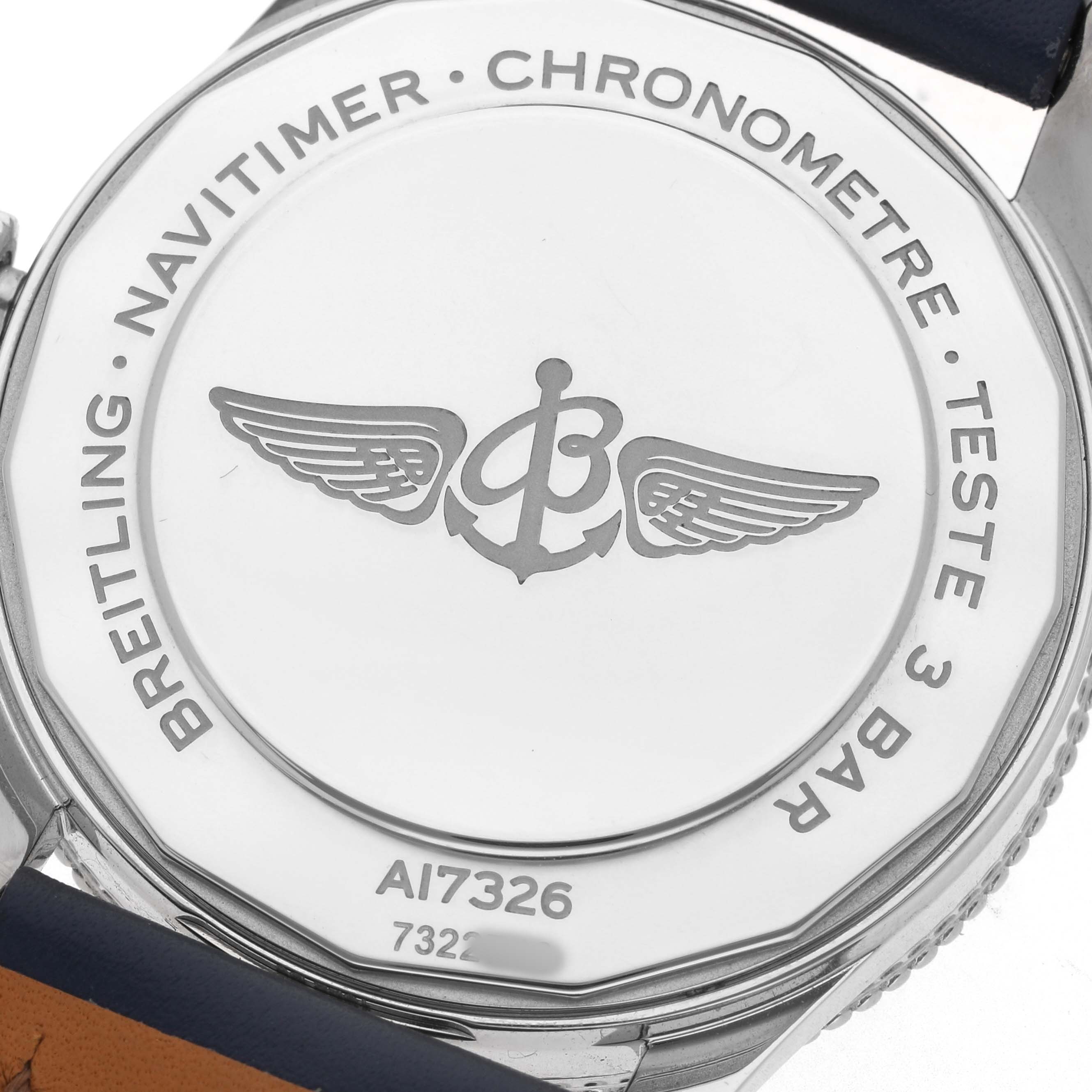 The image shows the back case of a Breitling Navitimer A17326 Men's Stainless Steel Blue Dial, featuring engraved text and a winged logo.