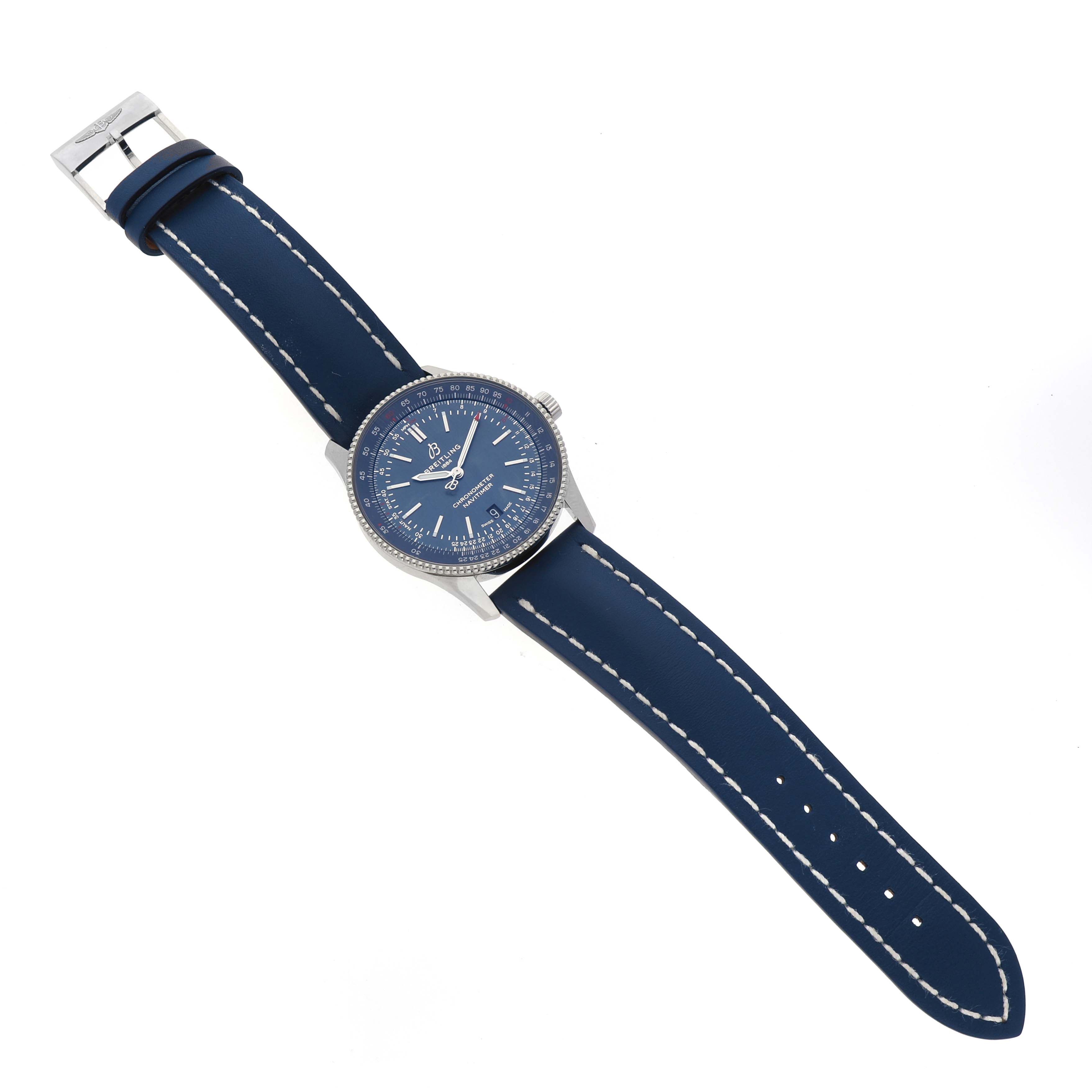 The Breitling Navitimer A17326 Men's Stainless Steel Blue Dial watch is shown from the top, displaying its blue dial, bezel, and leather strap with white stitching.