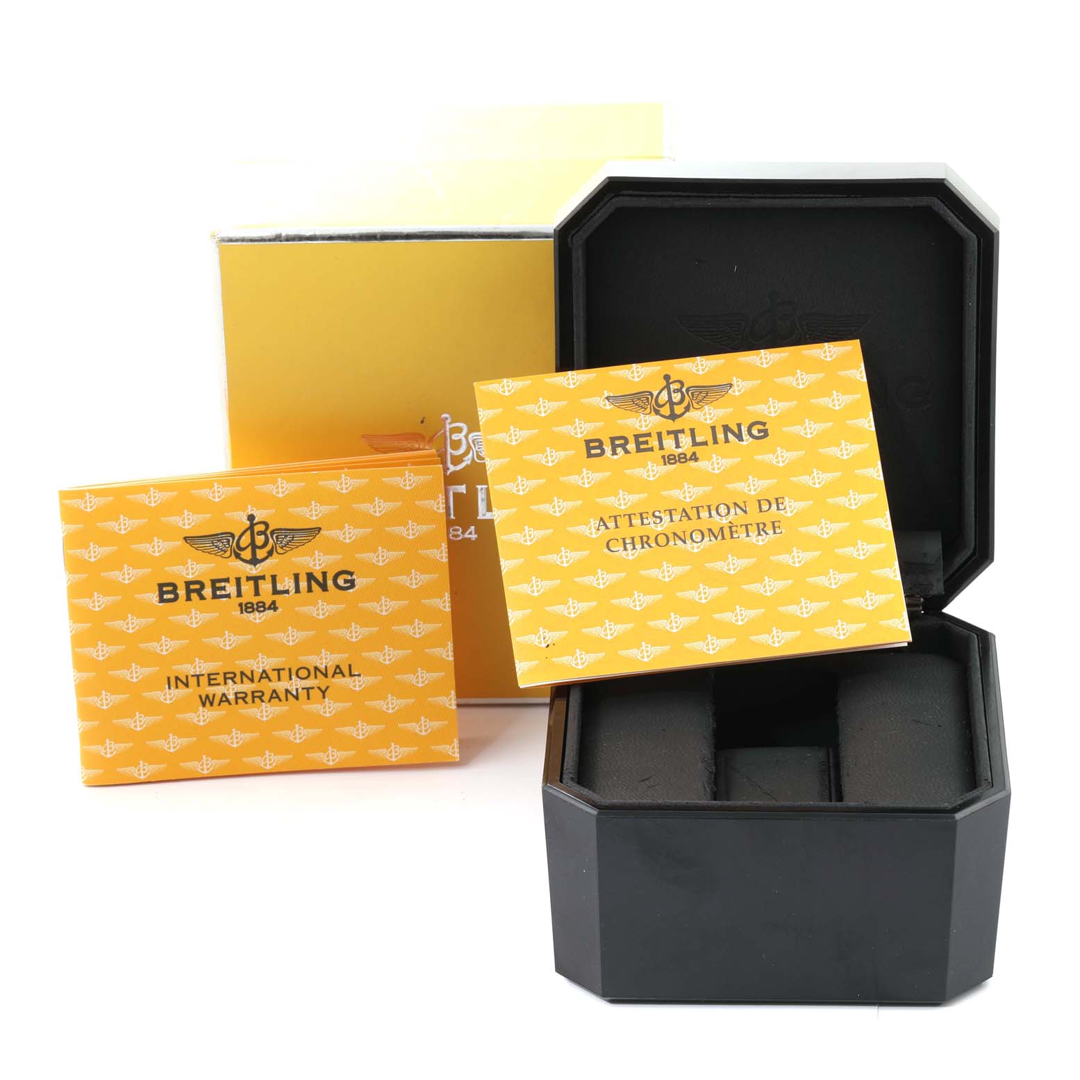 The image shows the box and documentation for the Breitling Navitimer A23322 Men
s Stainless Steel Black Dial A23322 Men
s Stainless Steel Black Dial watch, including the warranty and chronometer certificate.