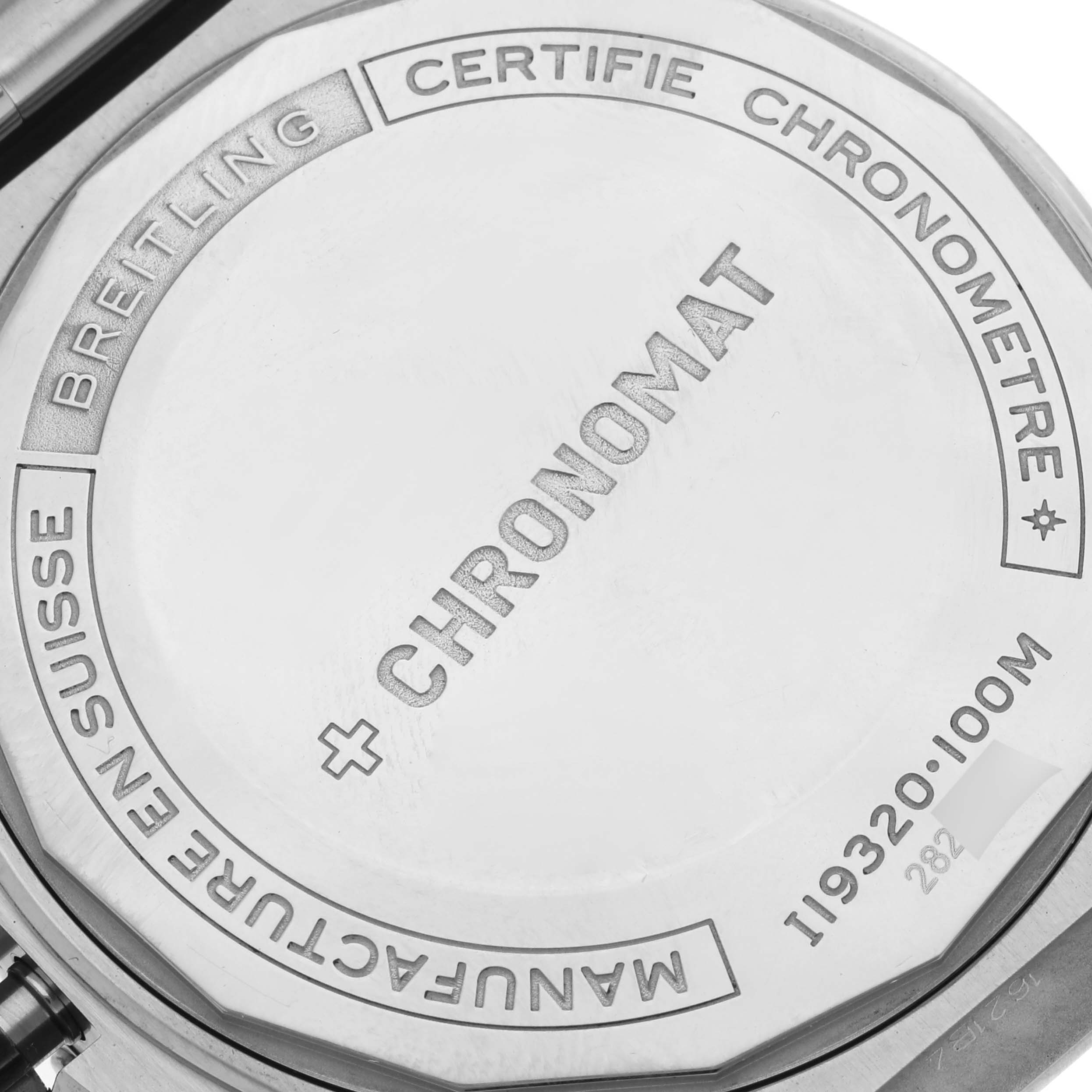 The image shows the back case of a Breitling Chronomat I19320 Men's Stainless Steel Black Dial I19320 Men's Stainless Steel Black Dial watch, highlighting the model details and certifications.