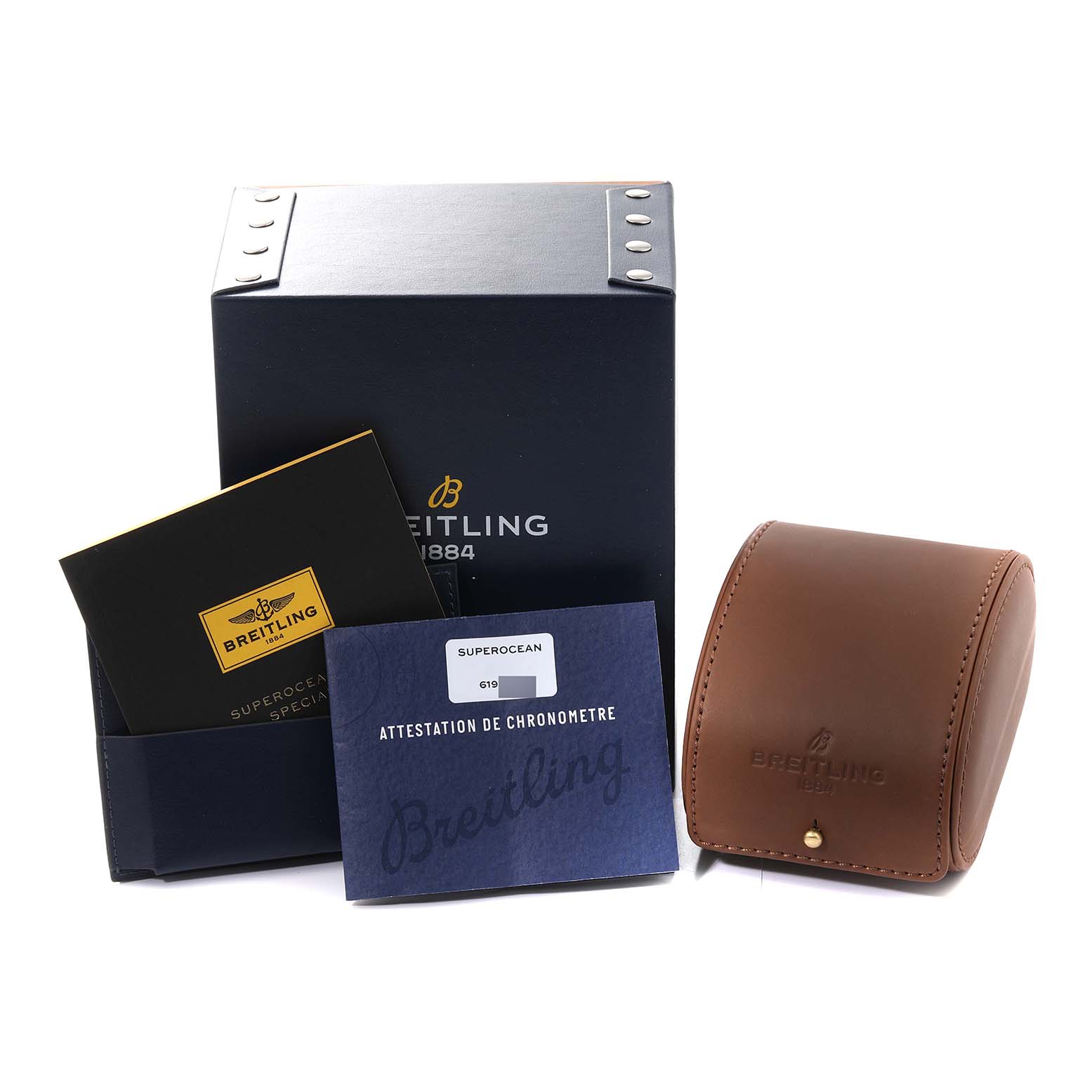The image shows the box, carrying case, and documentation for the Breitling Superocean M17393 Men's Stainless Steel Black Dial M17393 Men's Stainless Steel Black Dial watch.