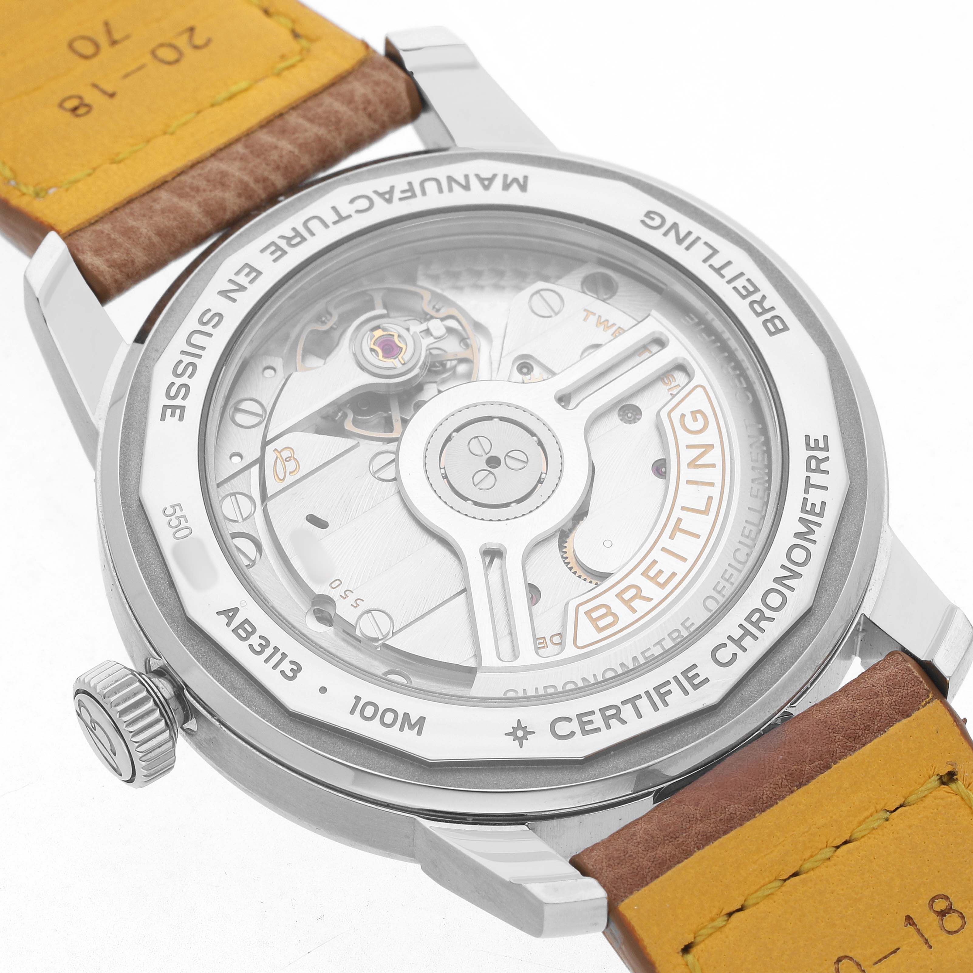 The image shows the back of a Breitling Premier AB3113 Men's Stainless Steel White Dial watch, highlighting its automatic movement and brown leather strap.