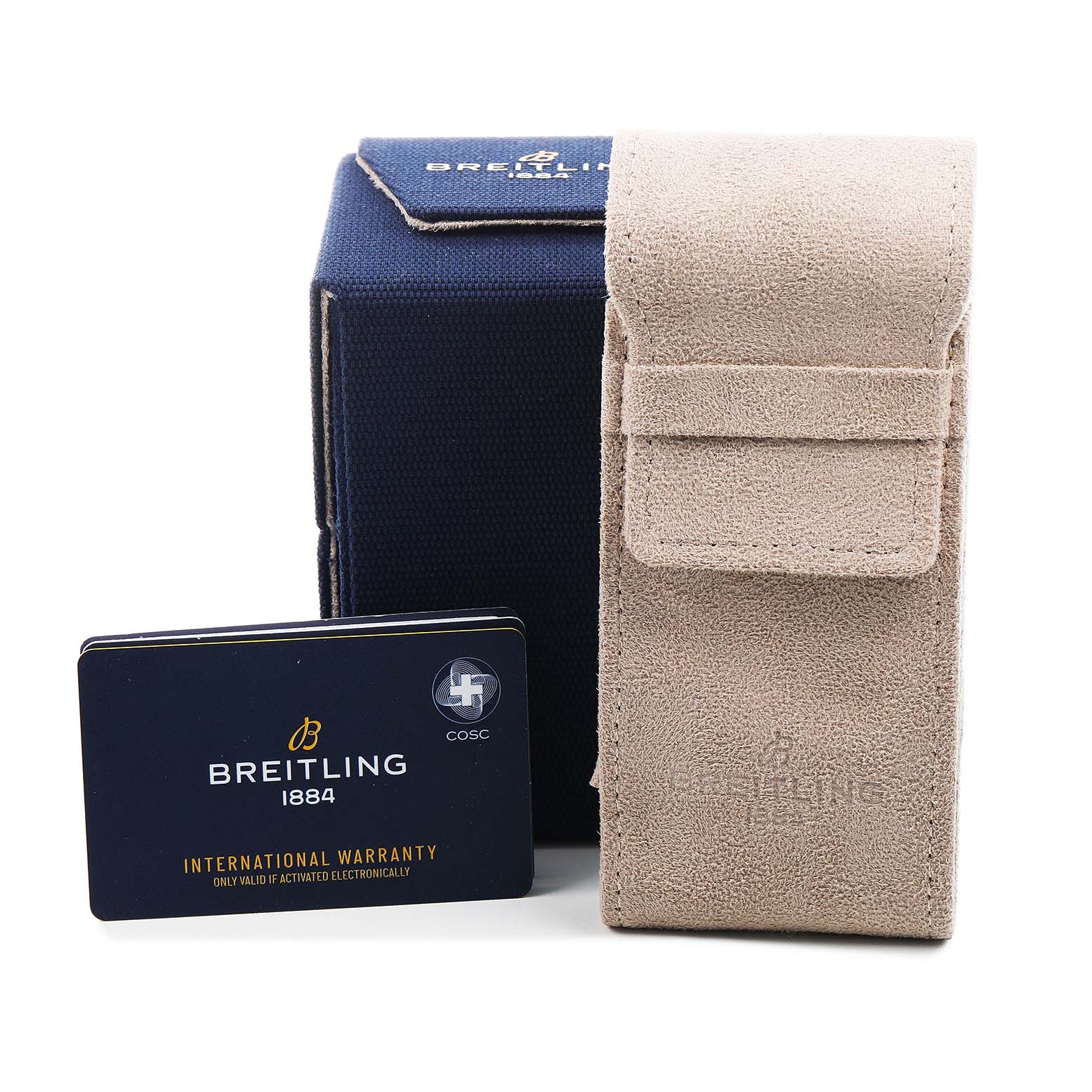 The image shows a Breitling Premier AB3113 Men's Stainless Steel White Dial model accessory set with a box, warranty card, and a suede pouch from a front angle.