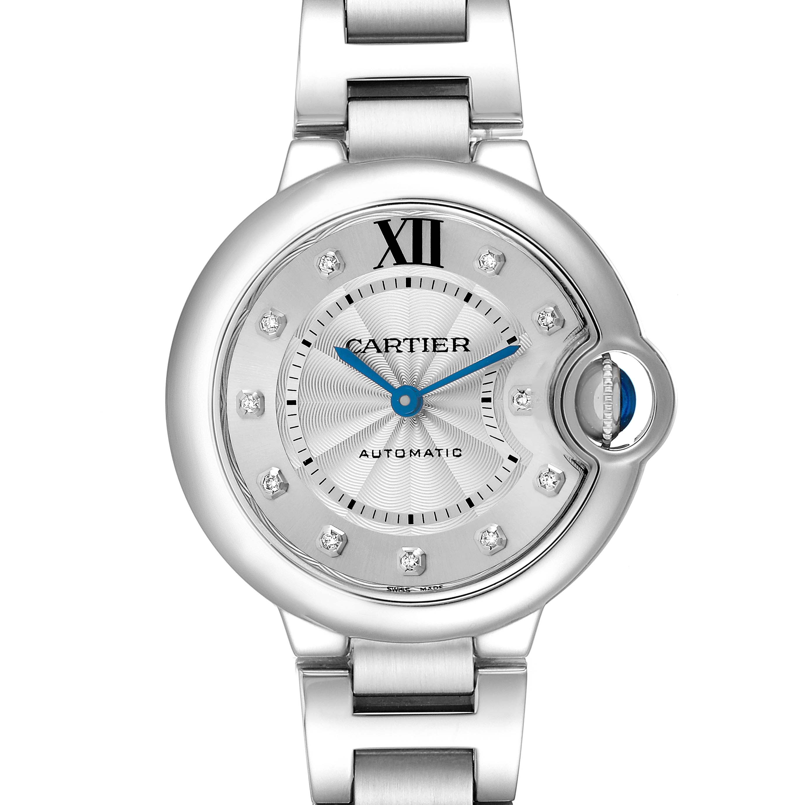 The Cartier Ballon Bleu WE902074 Women's Stainless Steel Silver Dial watch is shown from a front angle, highlighting the dial, roman numeral, and signature blue sapphire crown.
